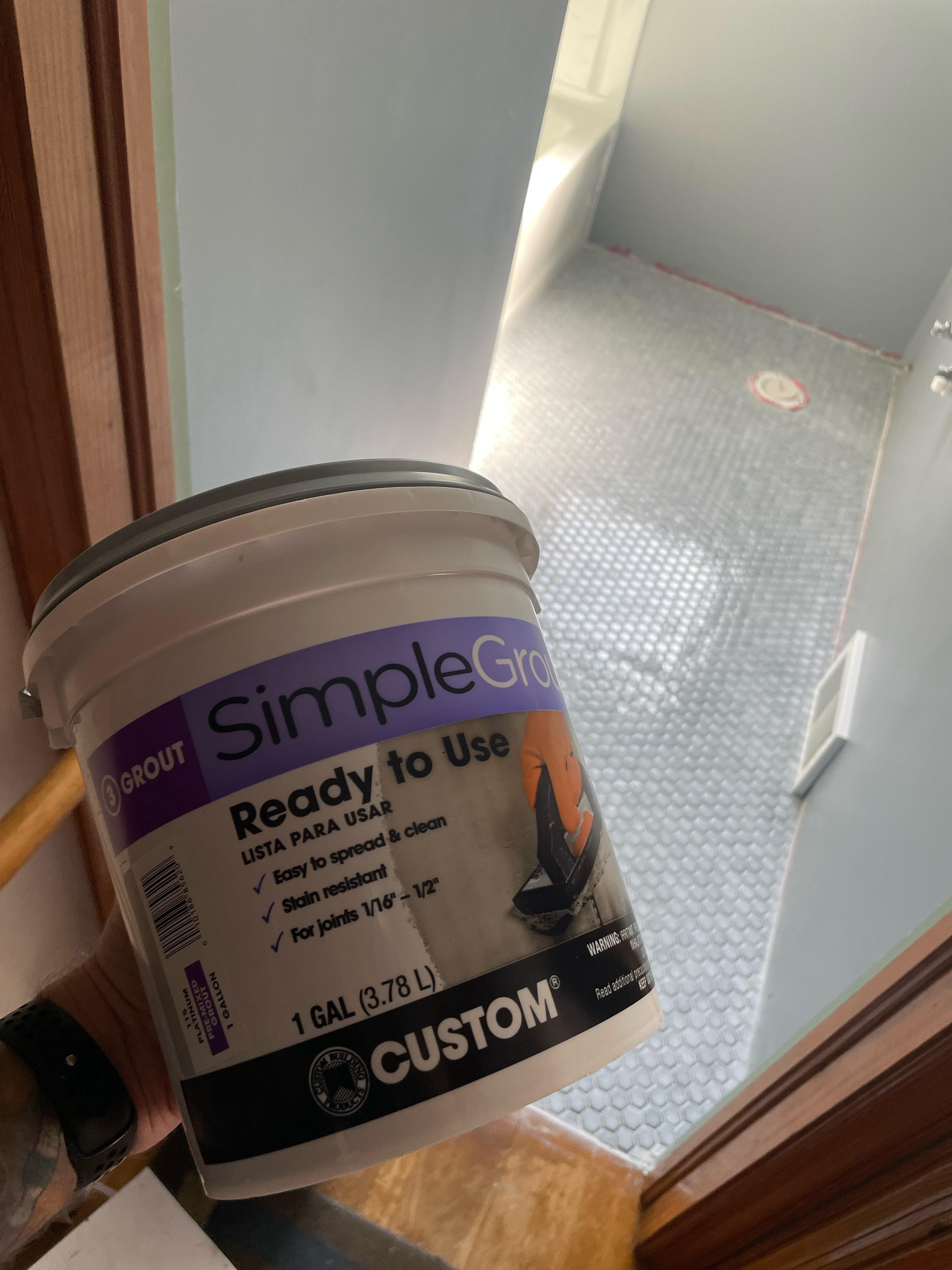 I used Simple Mix premixed colored grout for my bathroom floor. I’m