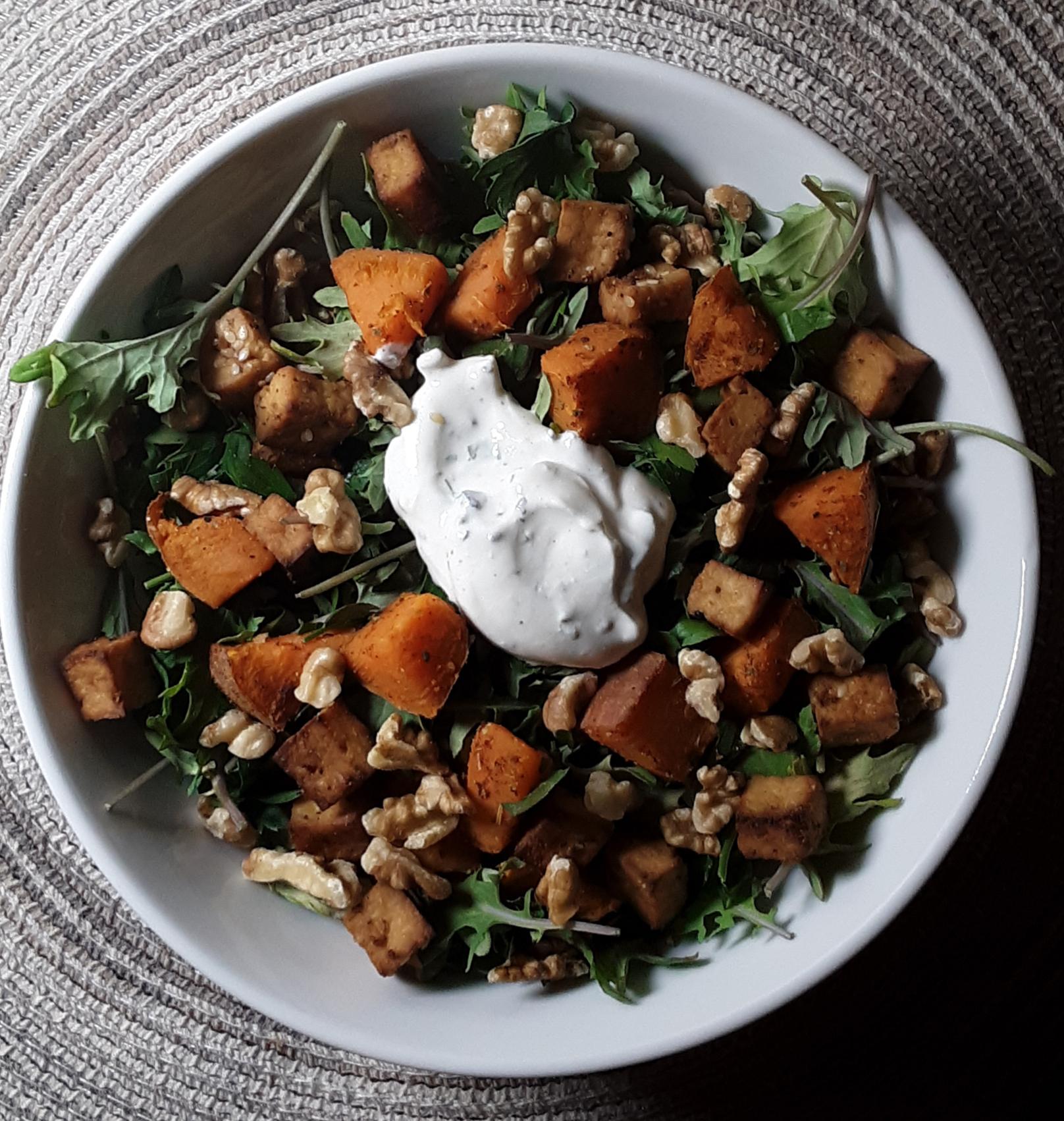 Kale salad, parsley, tofu, sweet potato, walnuts, and a homemade greek
