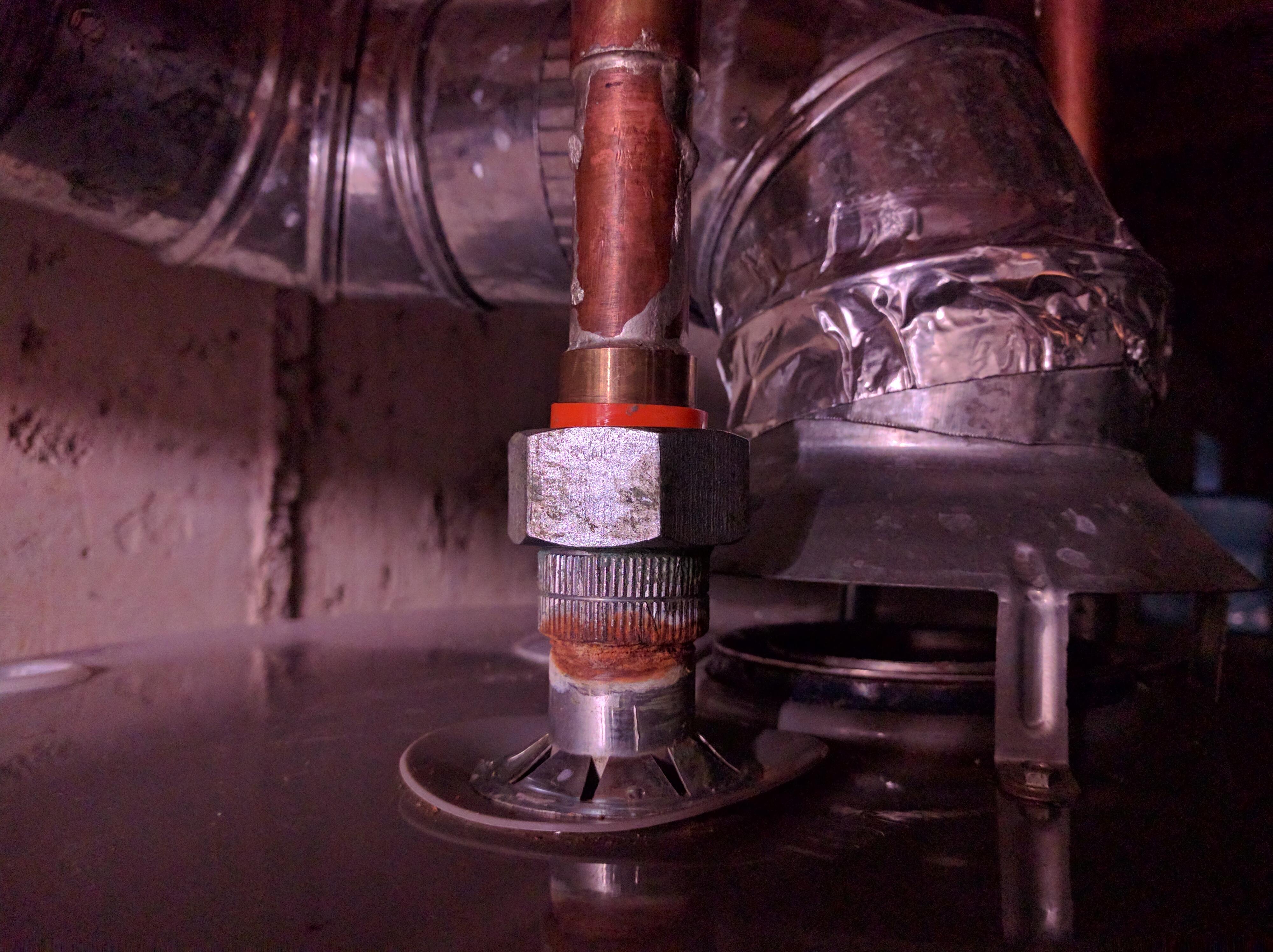 What is this crusty stuff on the water heater nipple? Is it dielectric