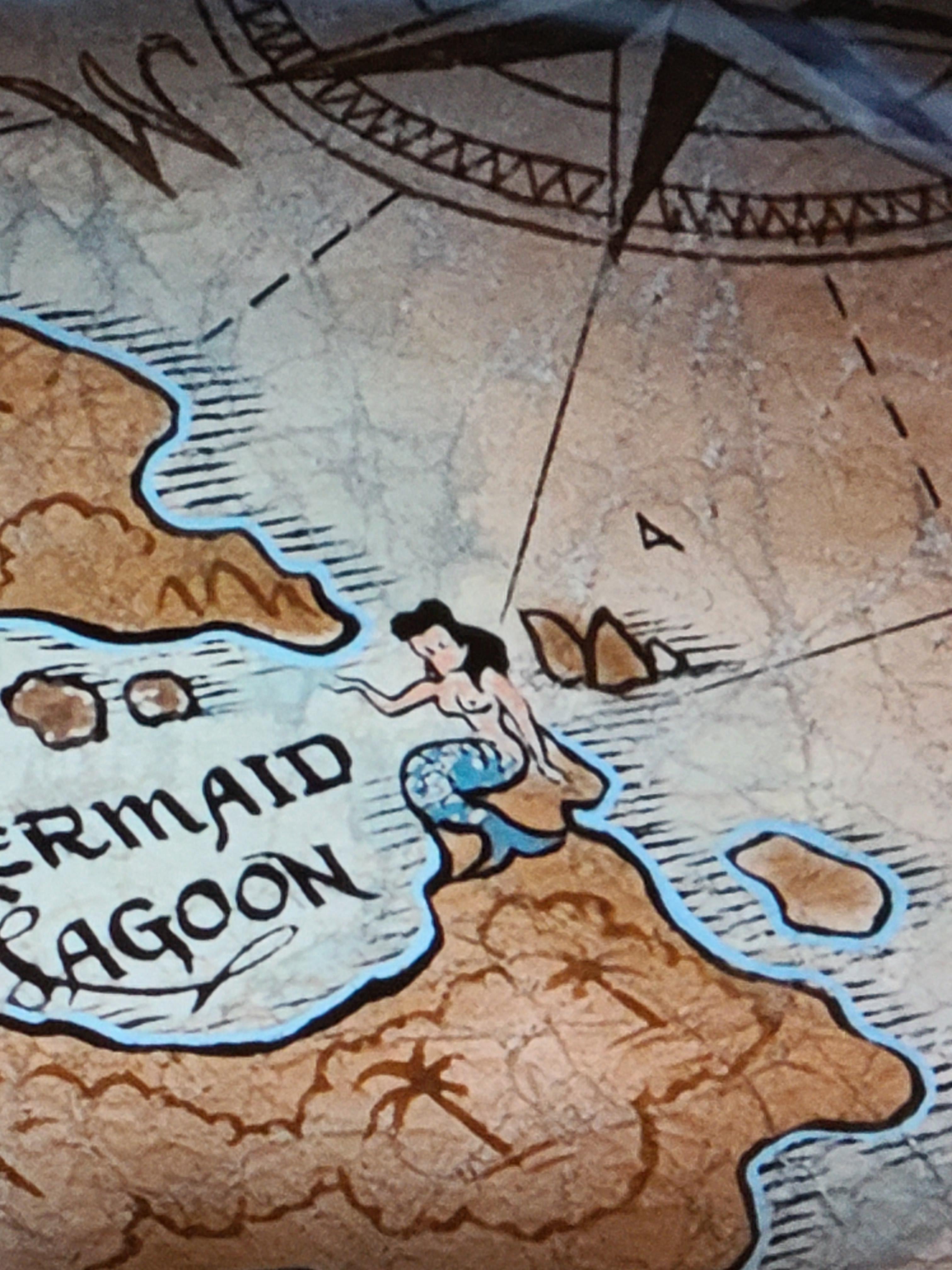 There is a topless mermaid drawing in Peter Pan : disney