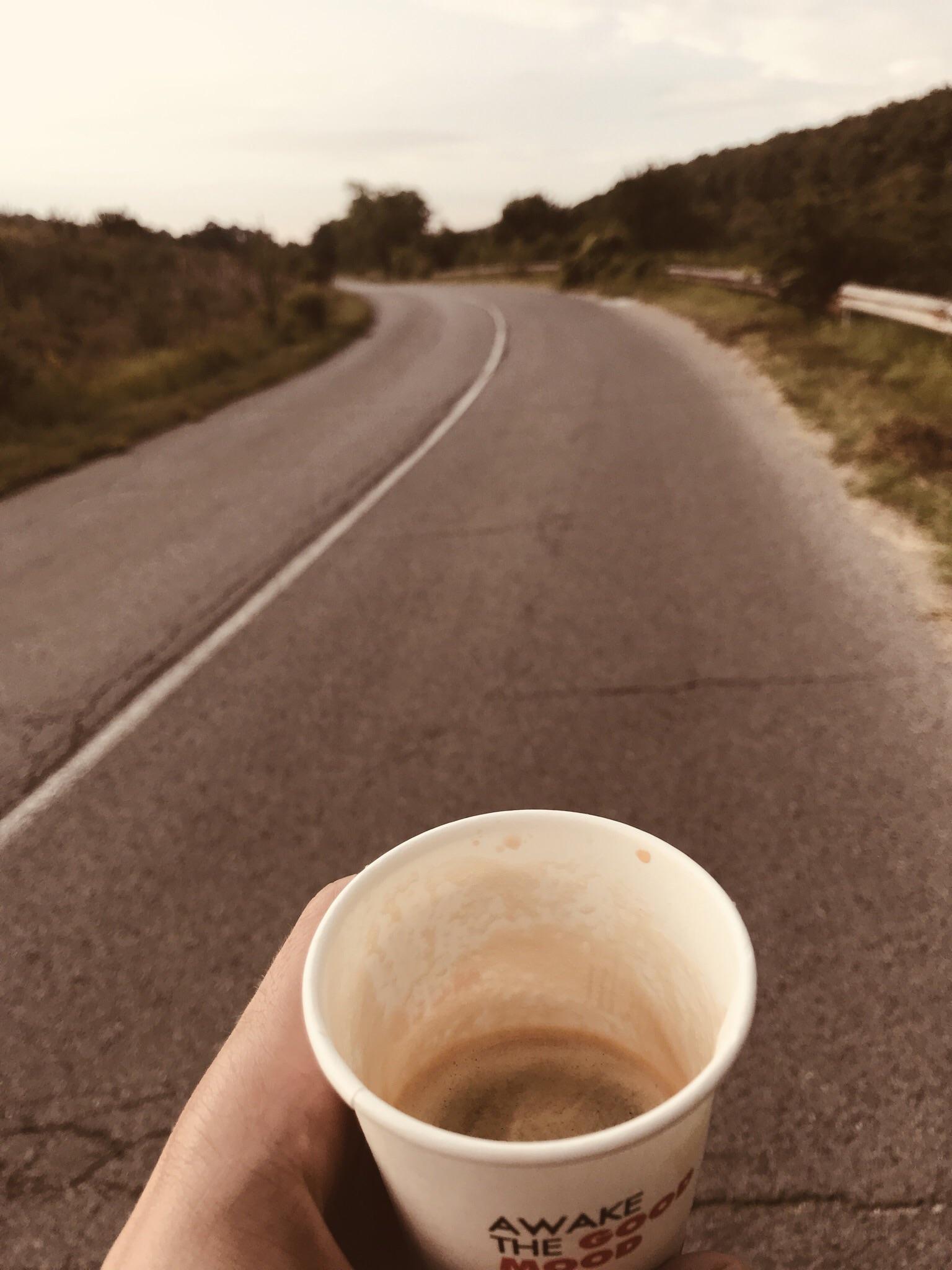 Drinking coffee while going up hill, so actually doing nothing. r