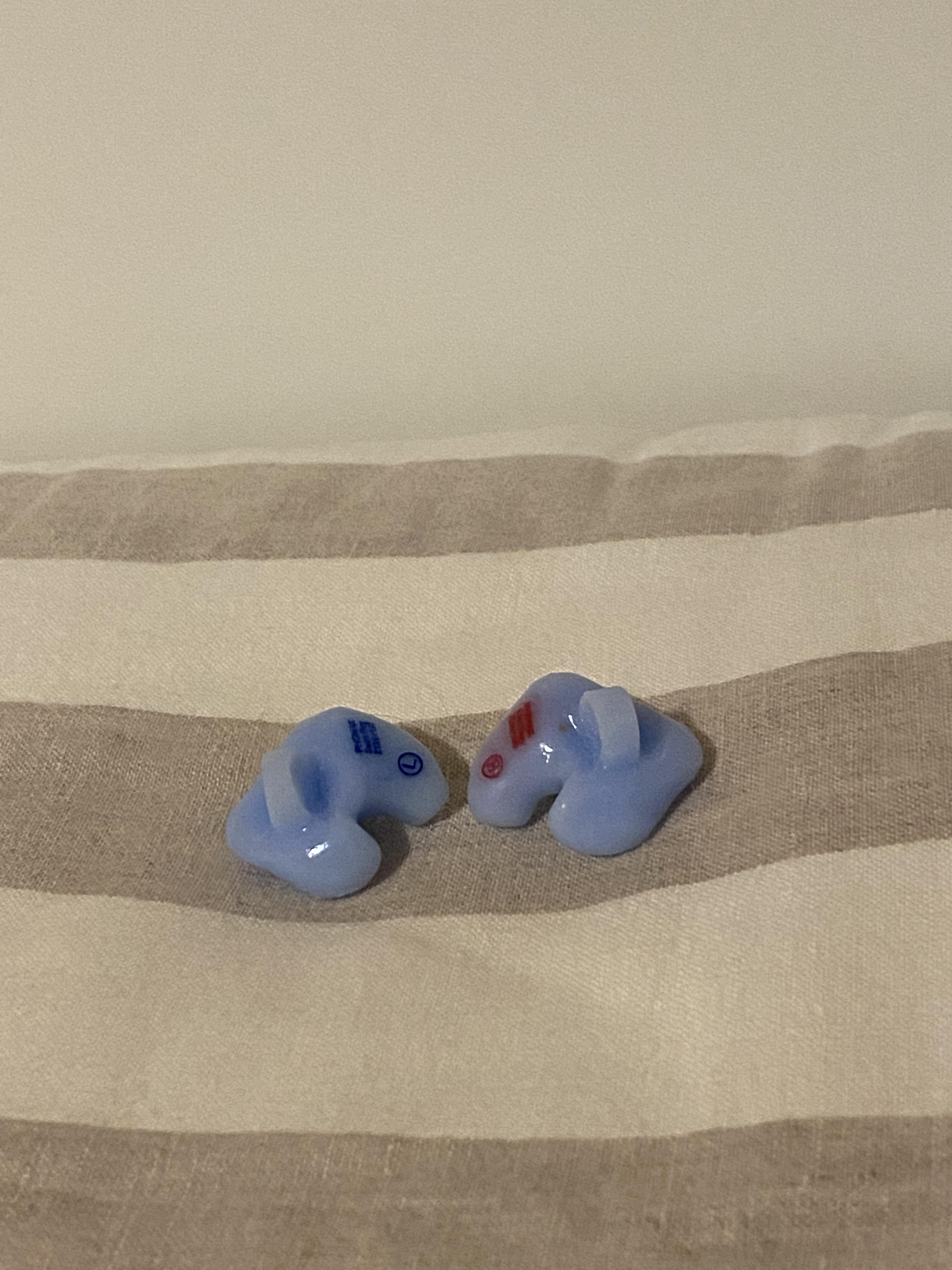 Got custom sleeping silicone earplugs made by an audiologist