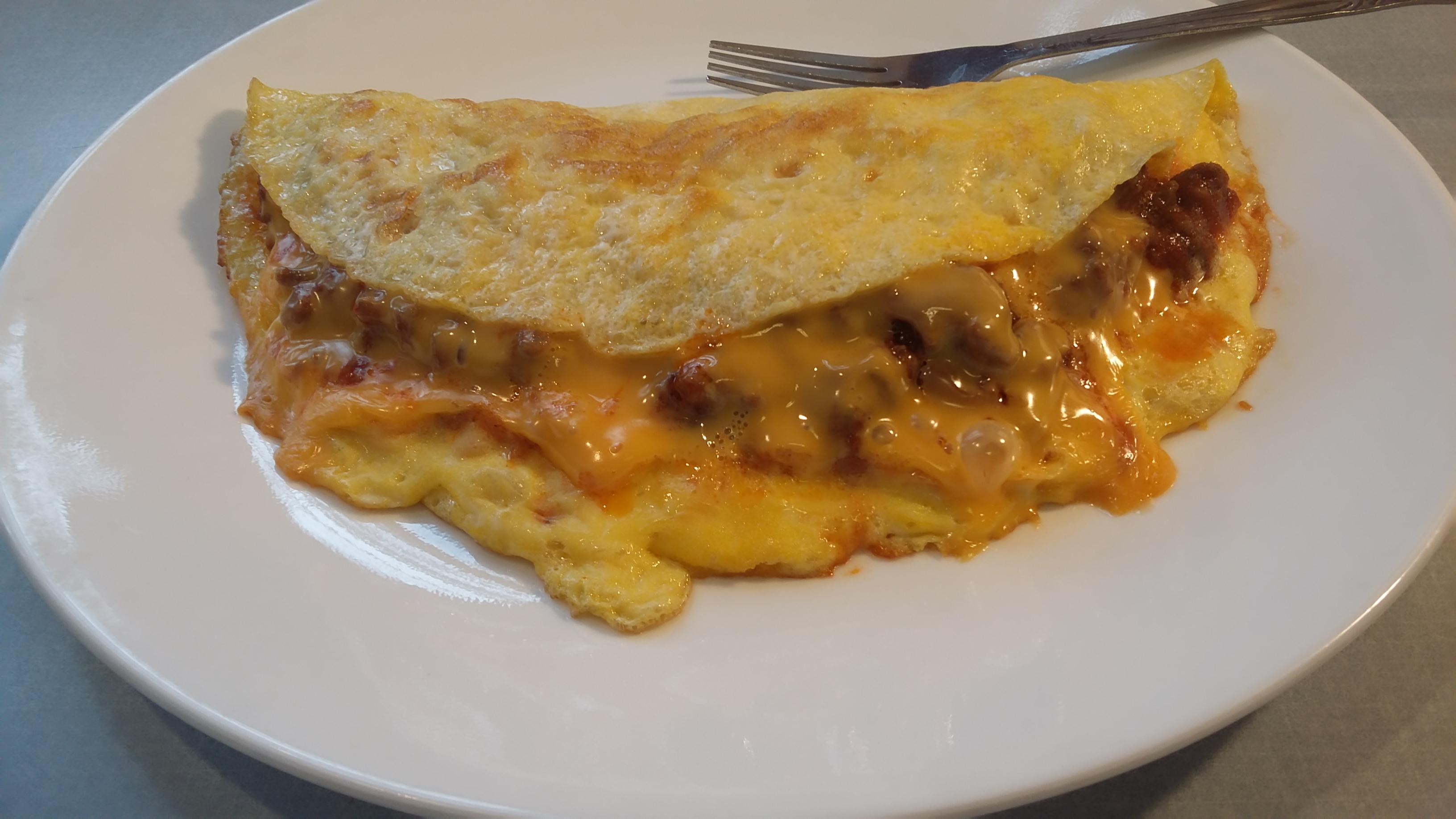 I made an omelette filled with sloppy joe and cheese, it was fucking