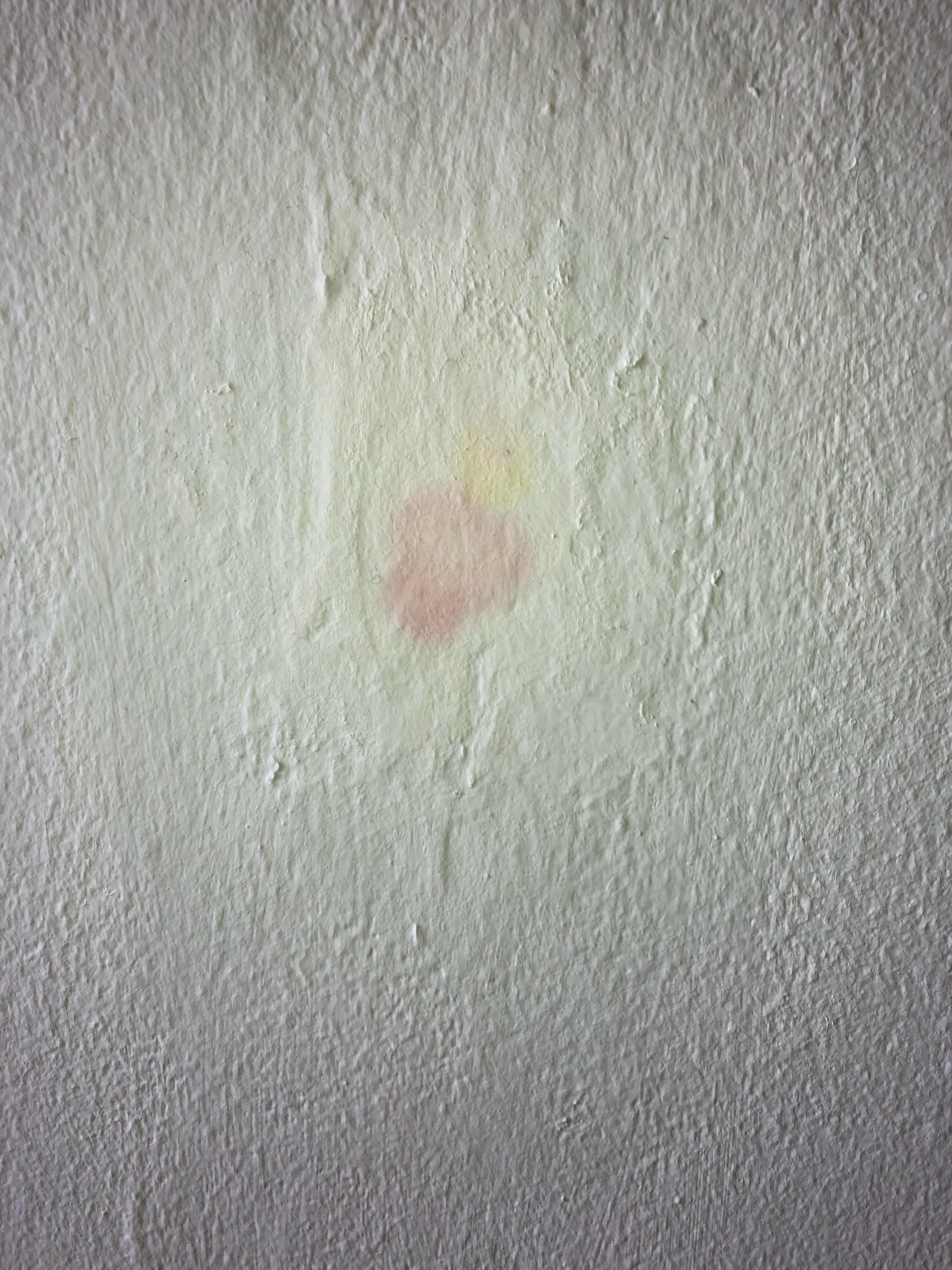 This spot of color does not disappear even after multiple coats of