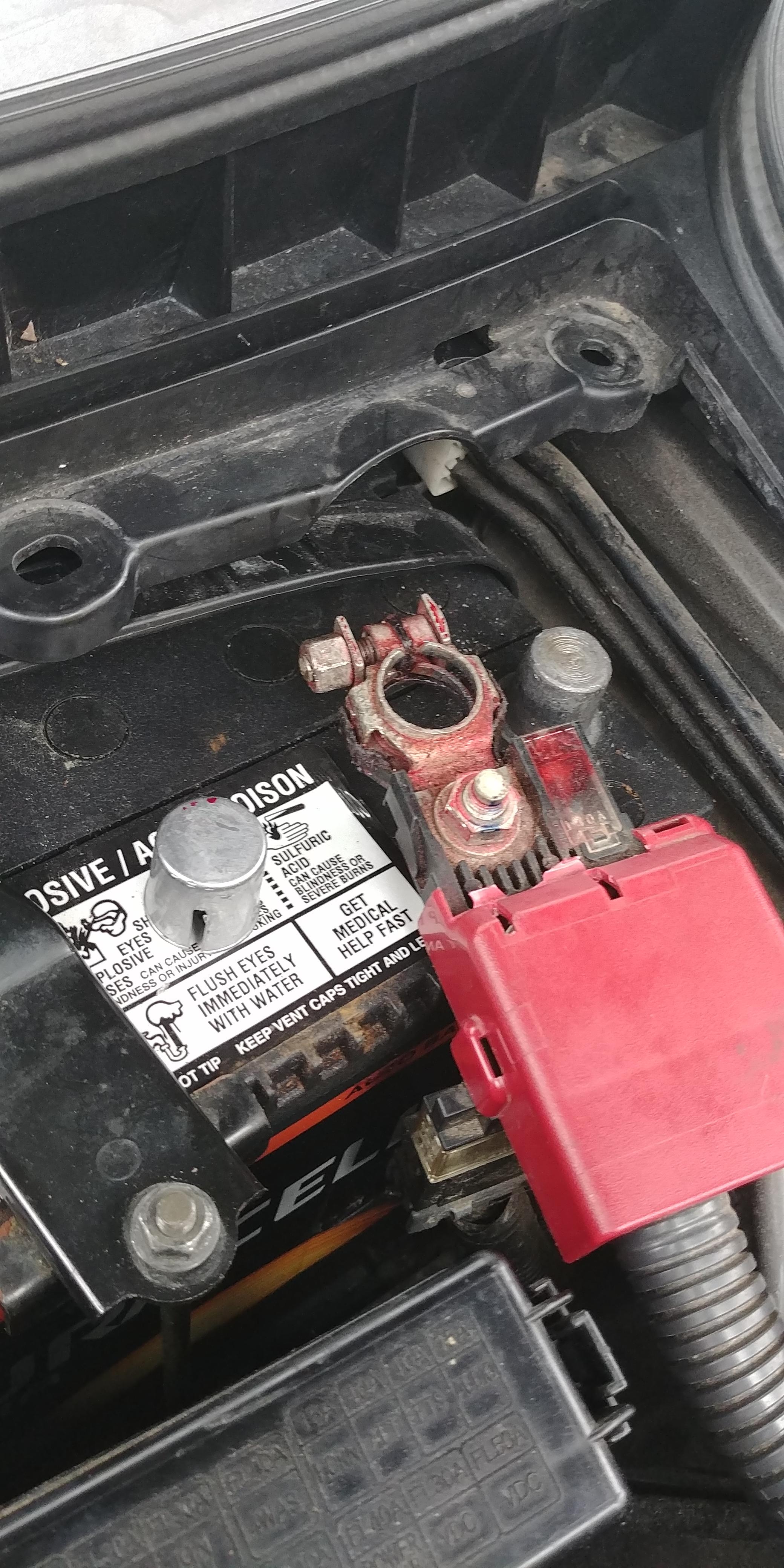 Any idea on how to fit this shim on the postive? It won't spread open