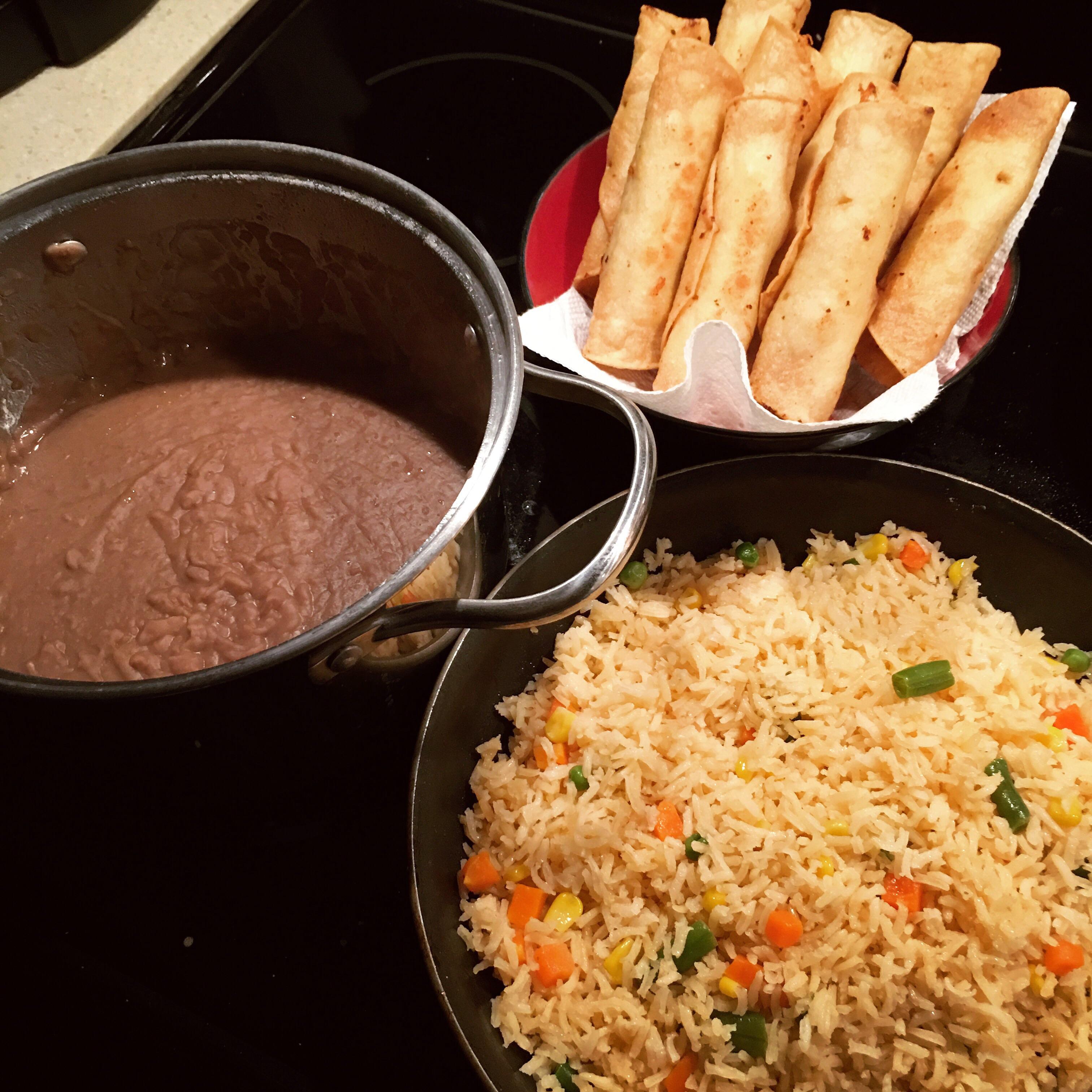 [Homemade] Chicken and cheese flautas, beans and rice r/food