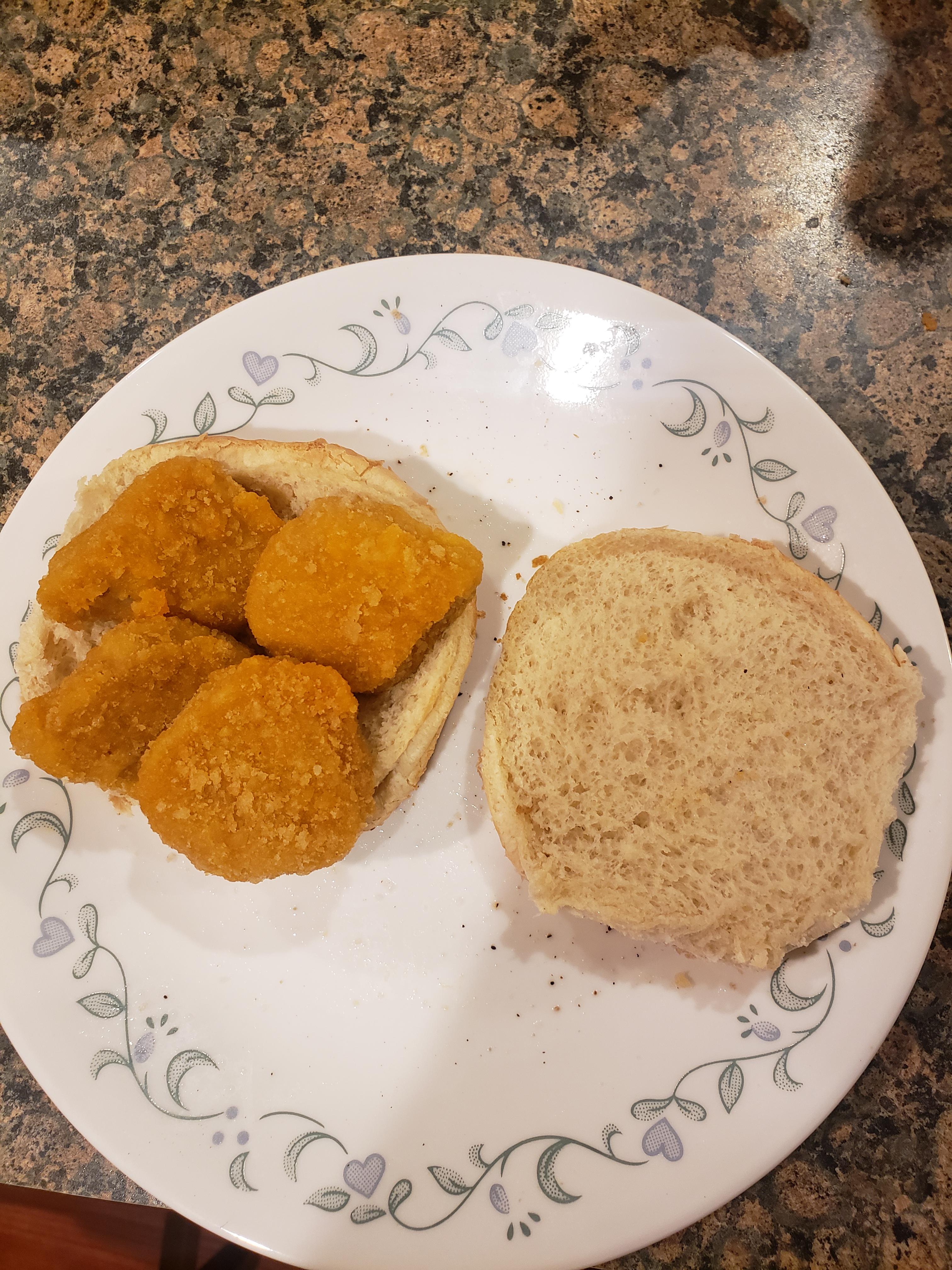 Had some monthsold, freezer burned chicken nuggets and a bun. Boom