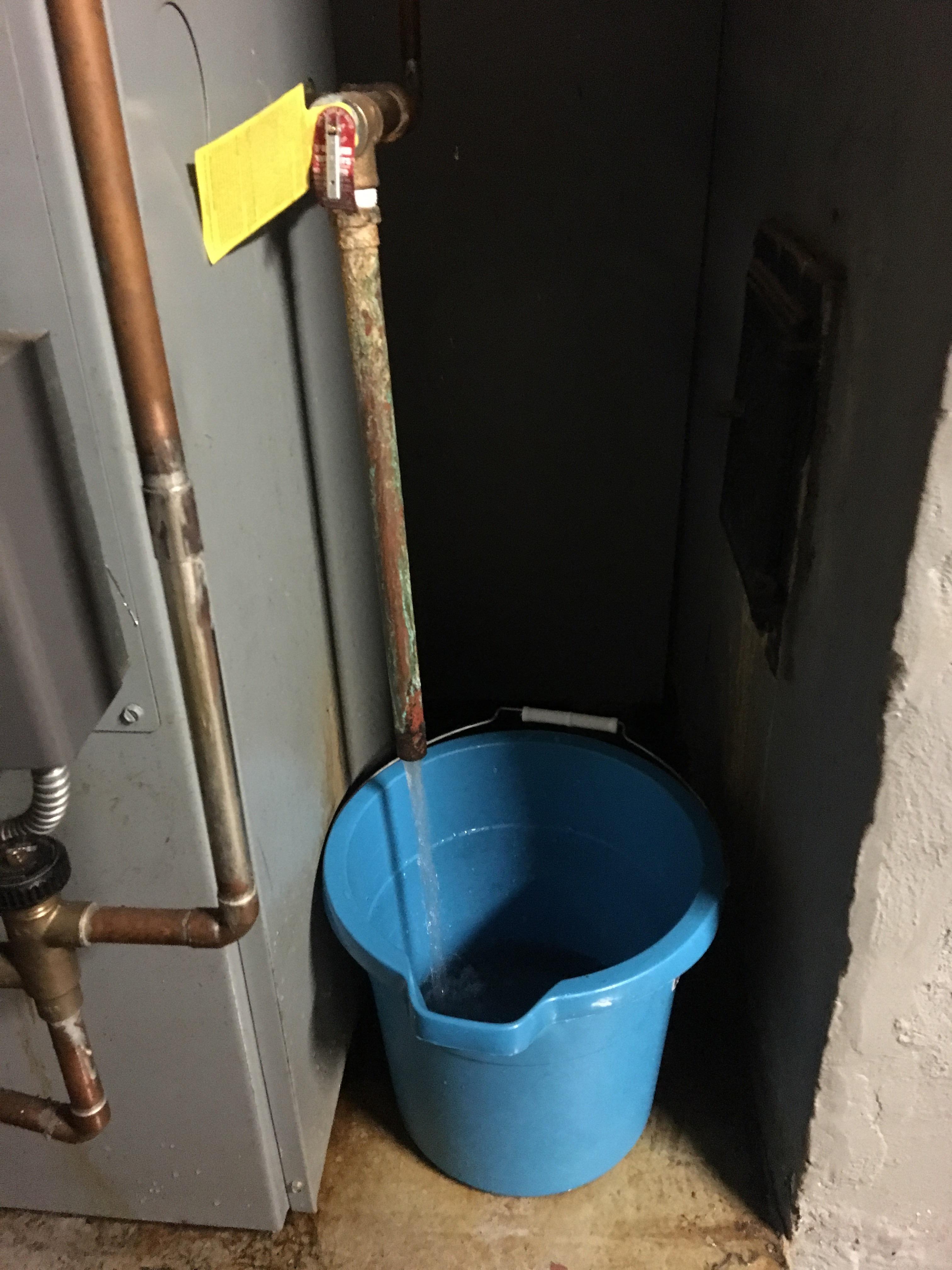 Help!!! Our furnace is pouring water out of this pipe anytime the