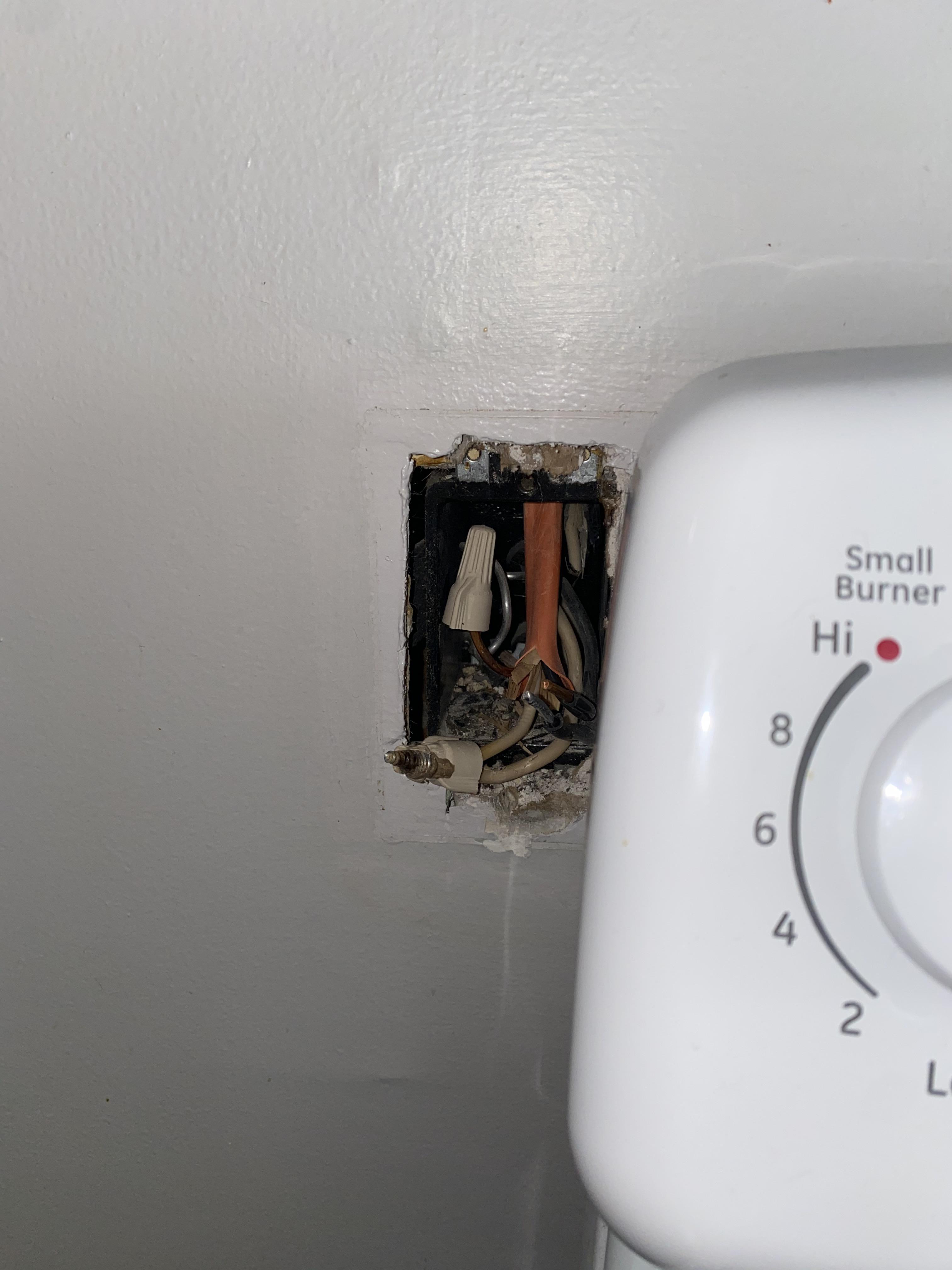 Low voltage at outlet for microwave. Opened the junction box, inside