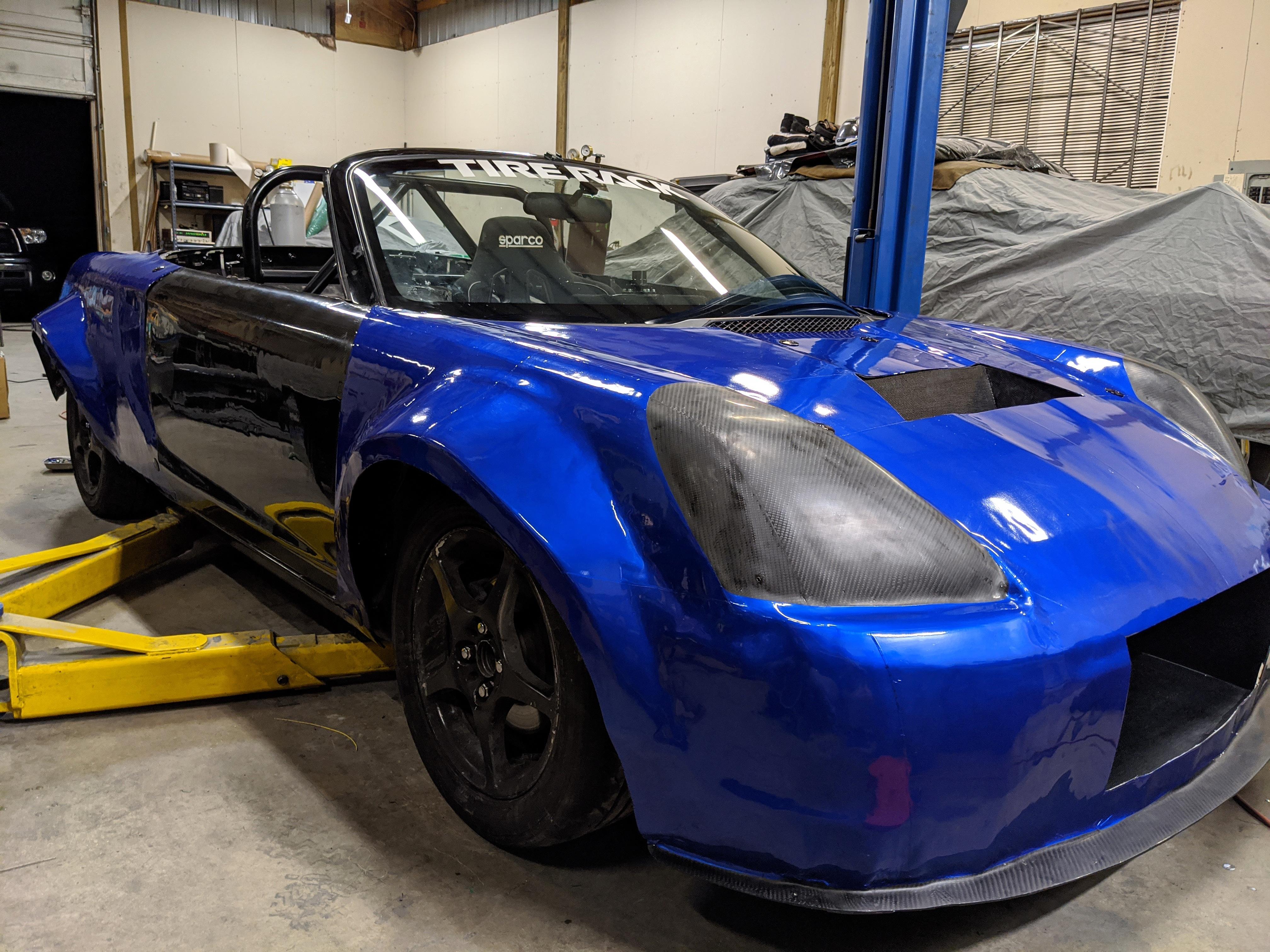 All carbon Toyota MR2 Spyder. Made one piece front end and rear end