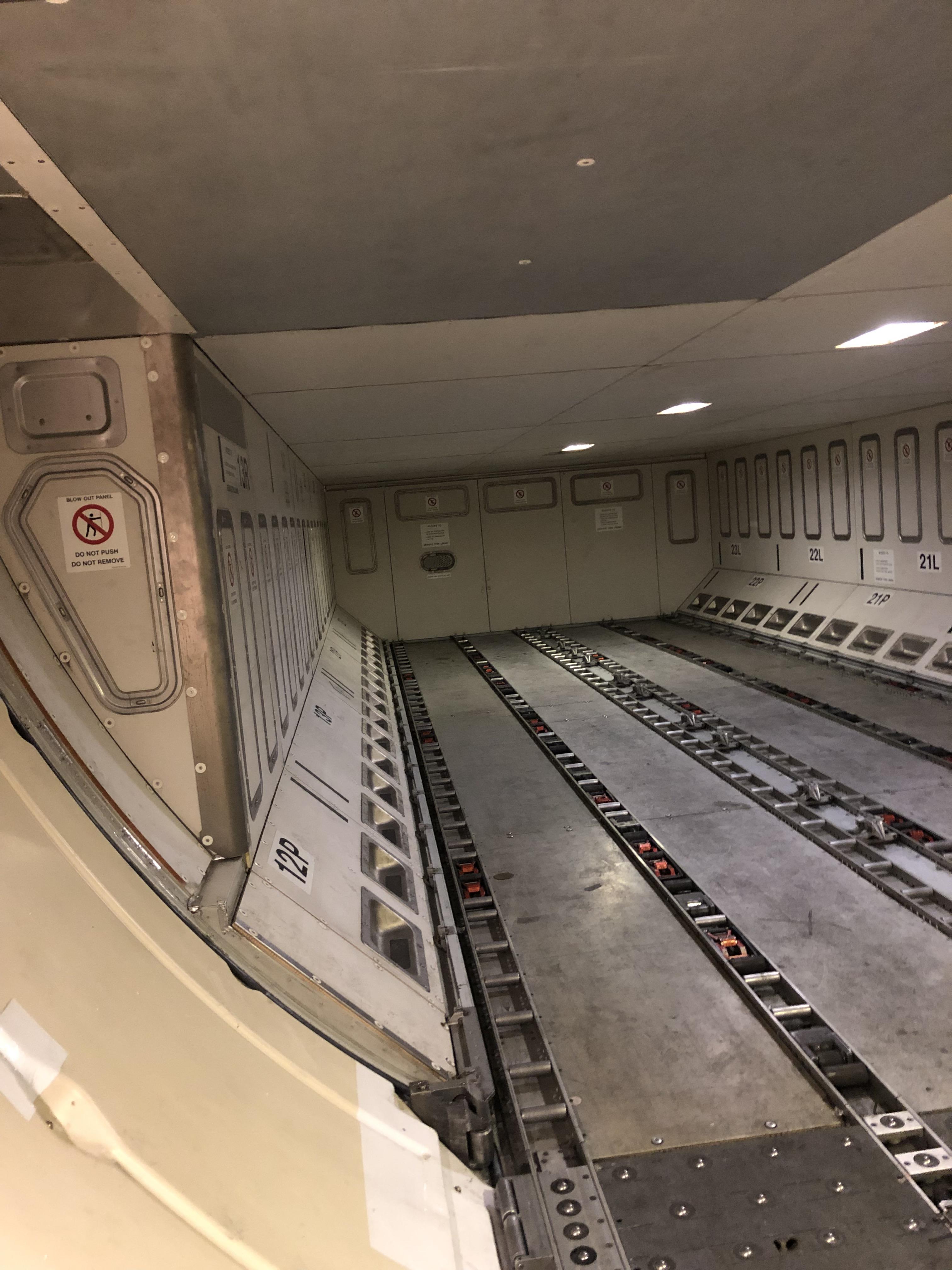 Forward cargo hold of a A330, looking aft. r/aviation