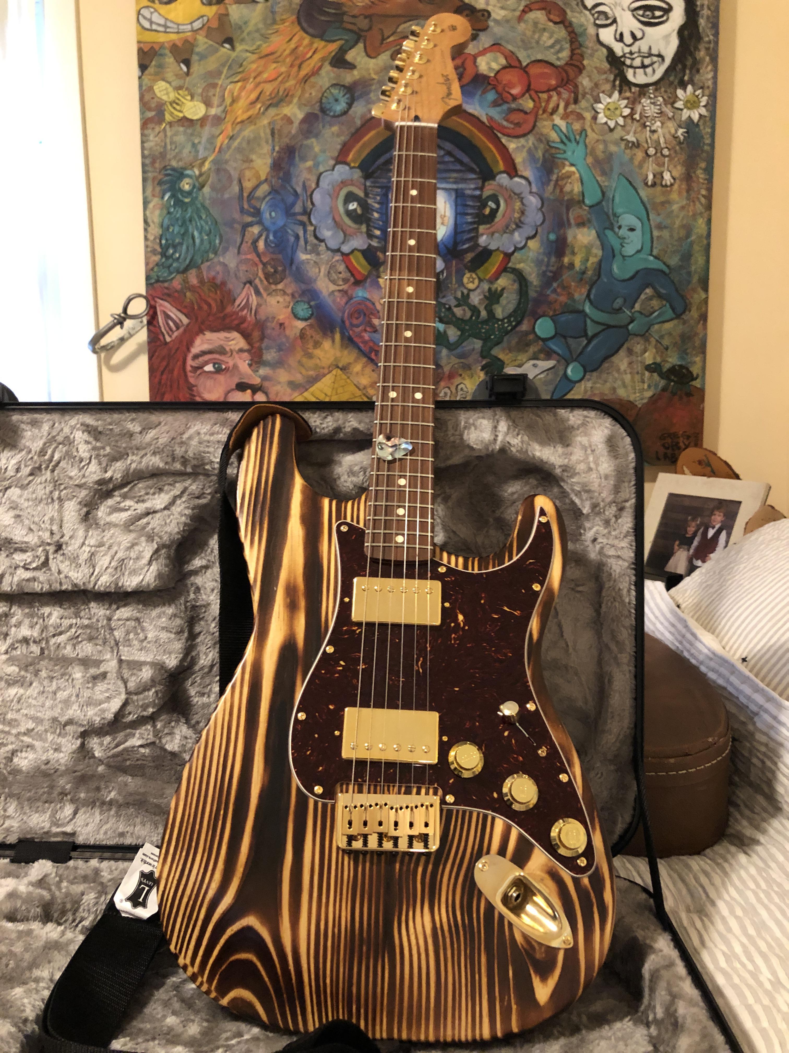 Torched basswood body Ipught off of eBay. Fender roasted maple nock pau