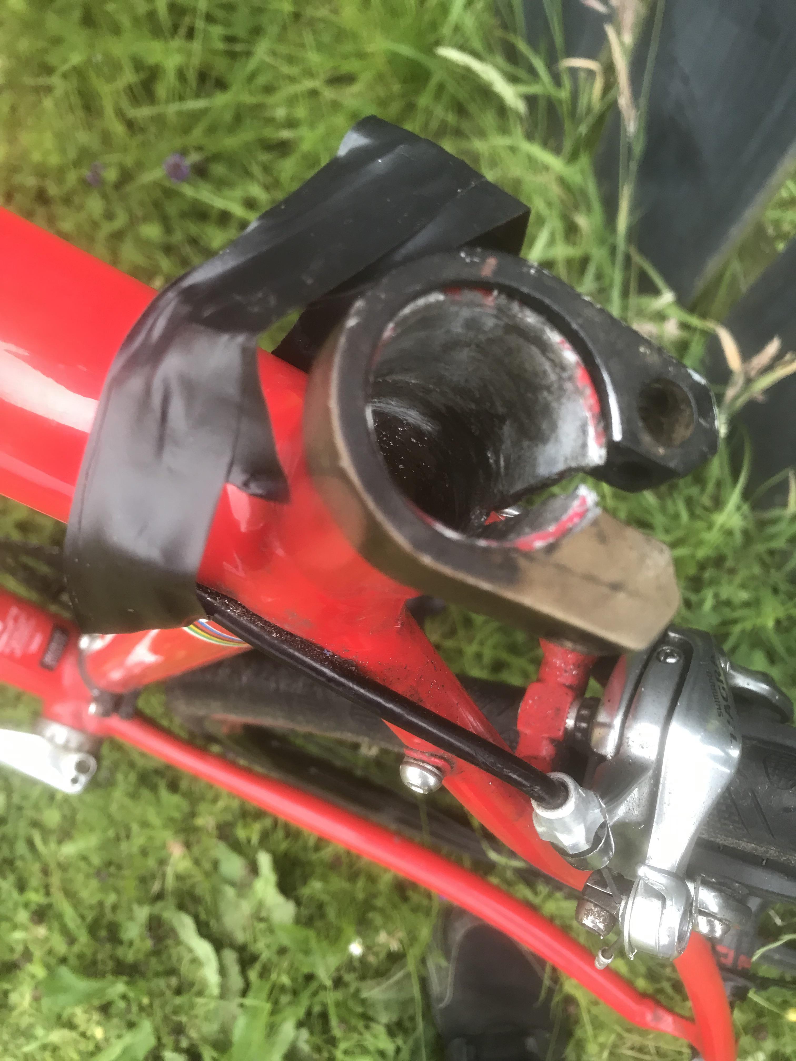 Corroded seatpost removed from frame but the seat tube is still a bit