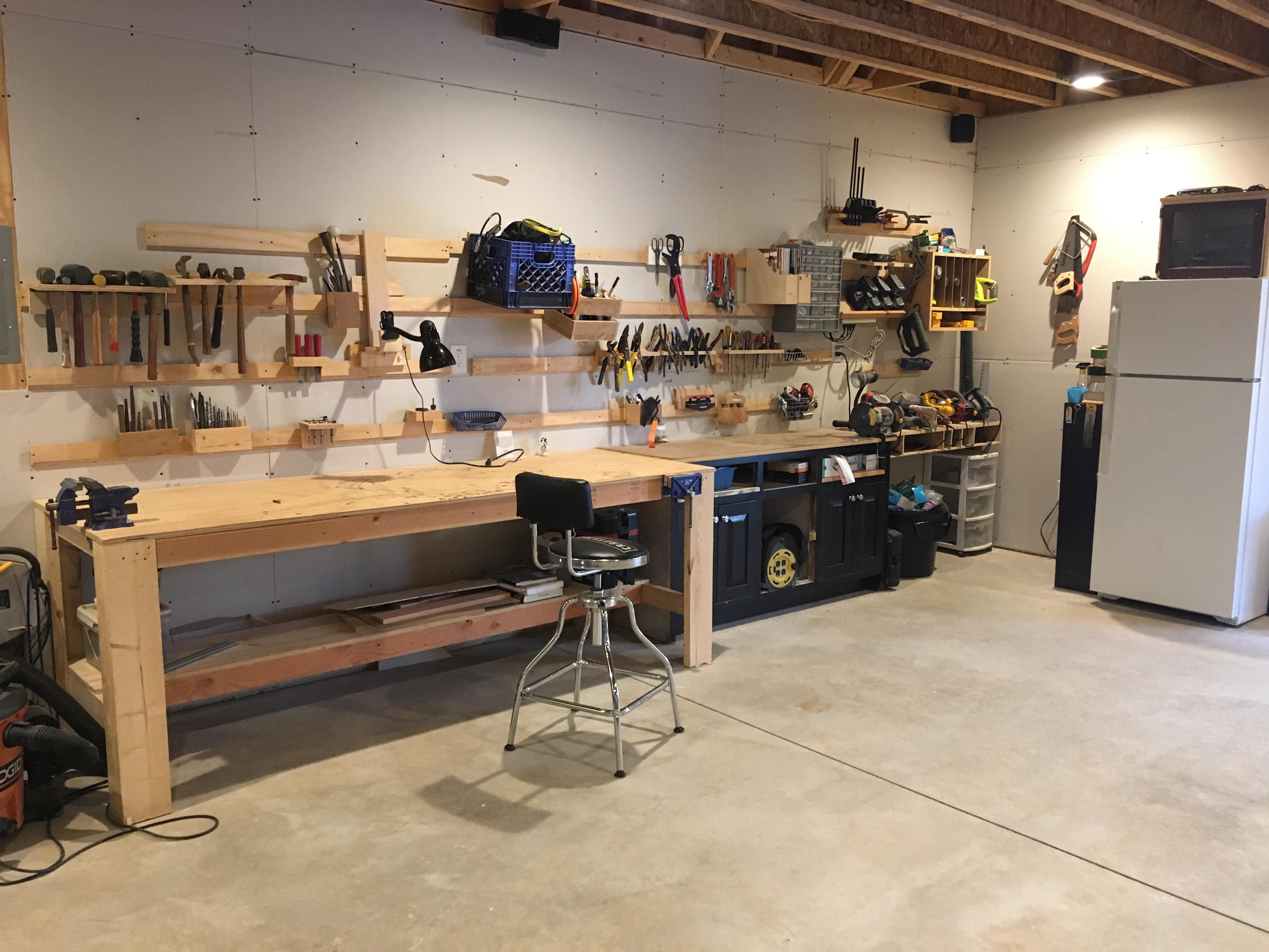 My workbench with french cleats. I also repurposed a old bathroom vanity. r/Workbenches