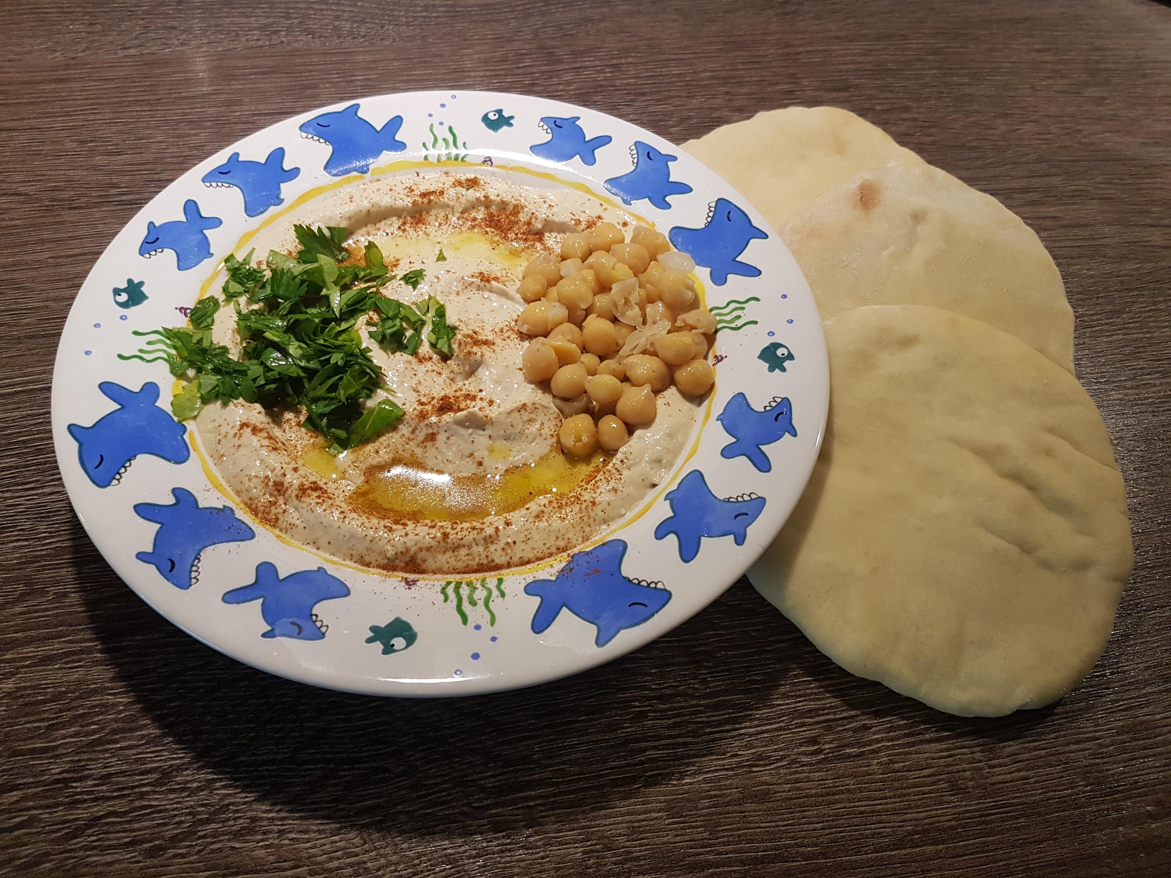 Hummus Tehina with pita bread r/VegRecipes