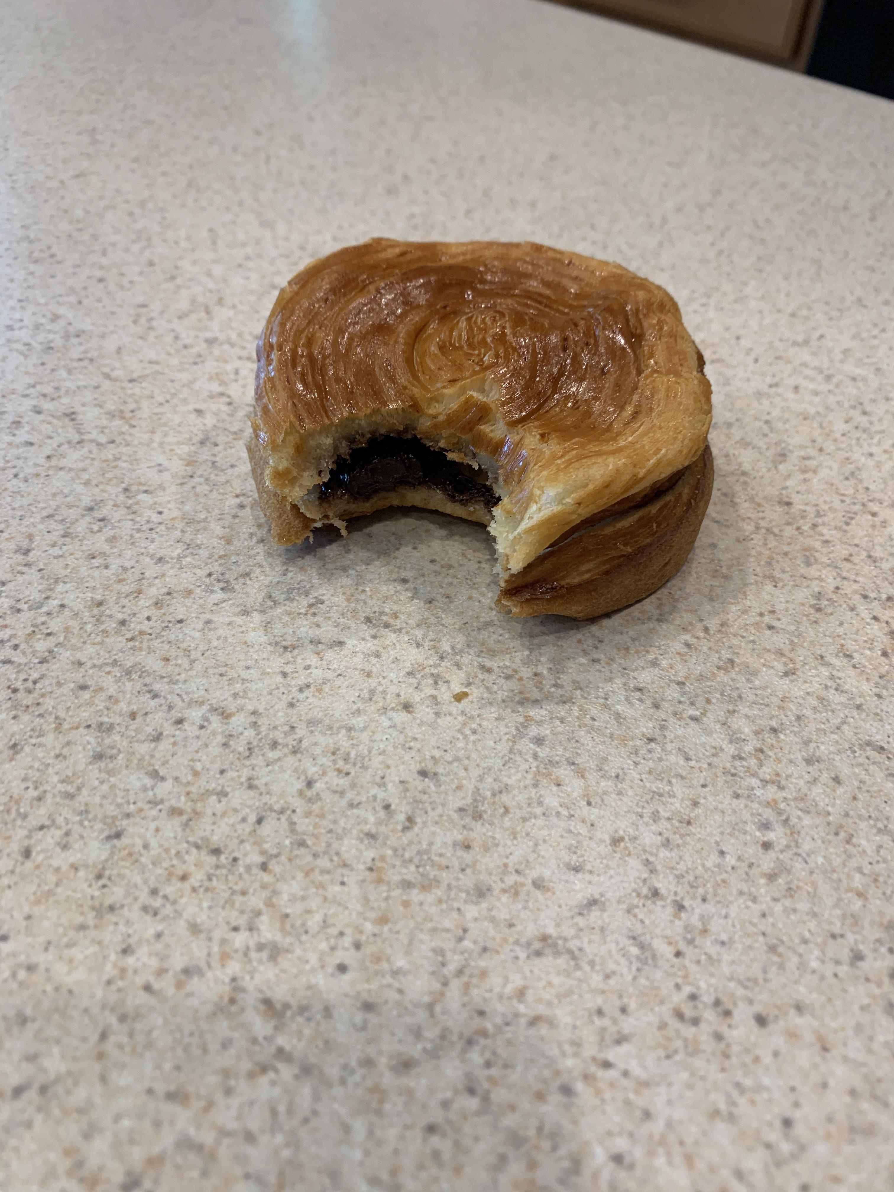 Croissant bun, toasted with dark chocolate in the middle. A shittier
