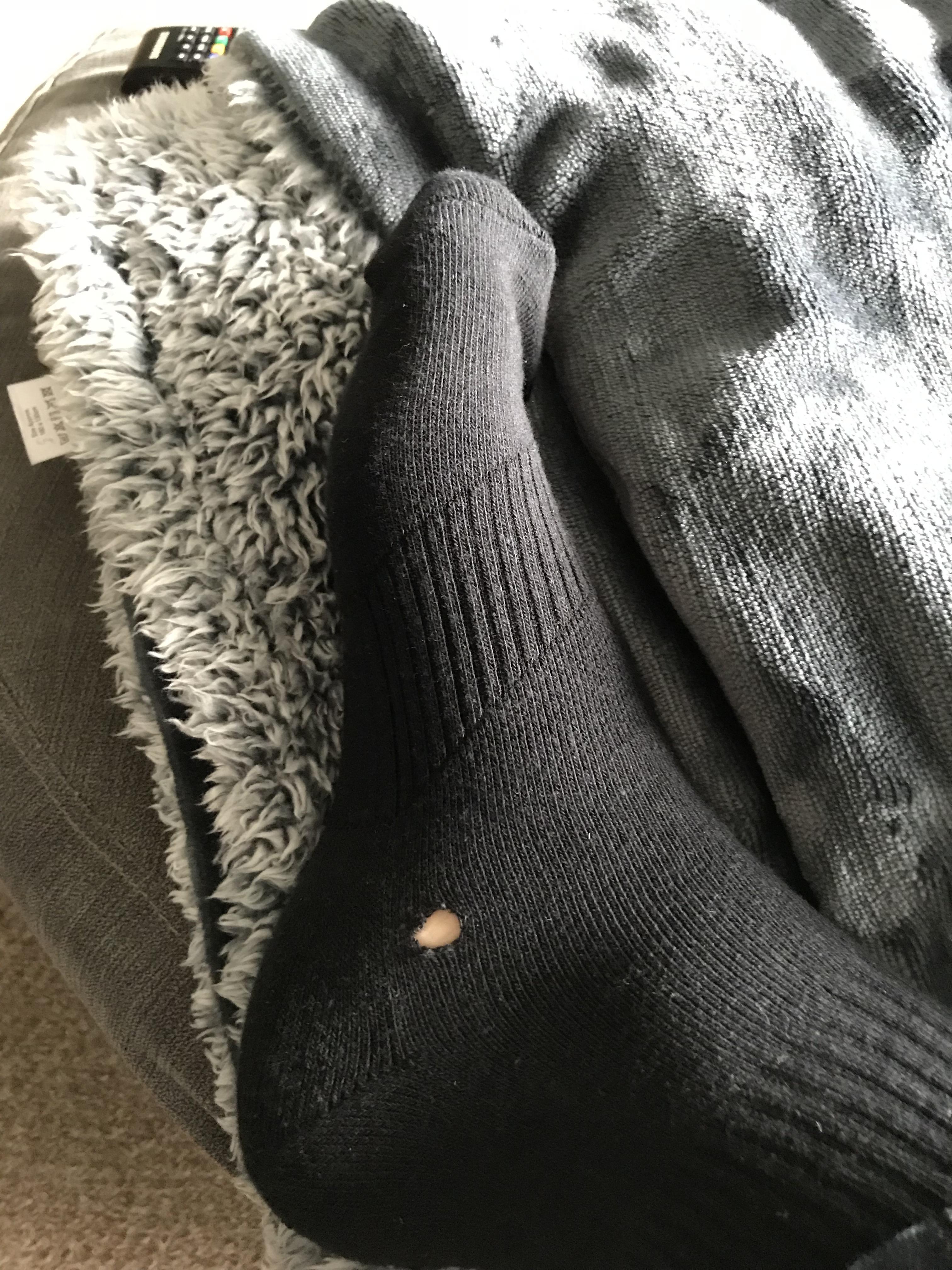 Cut a hole in a new pair of socks getting them out of the damn