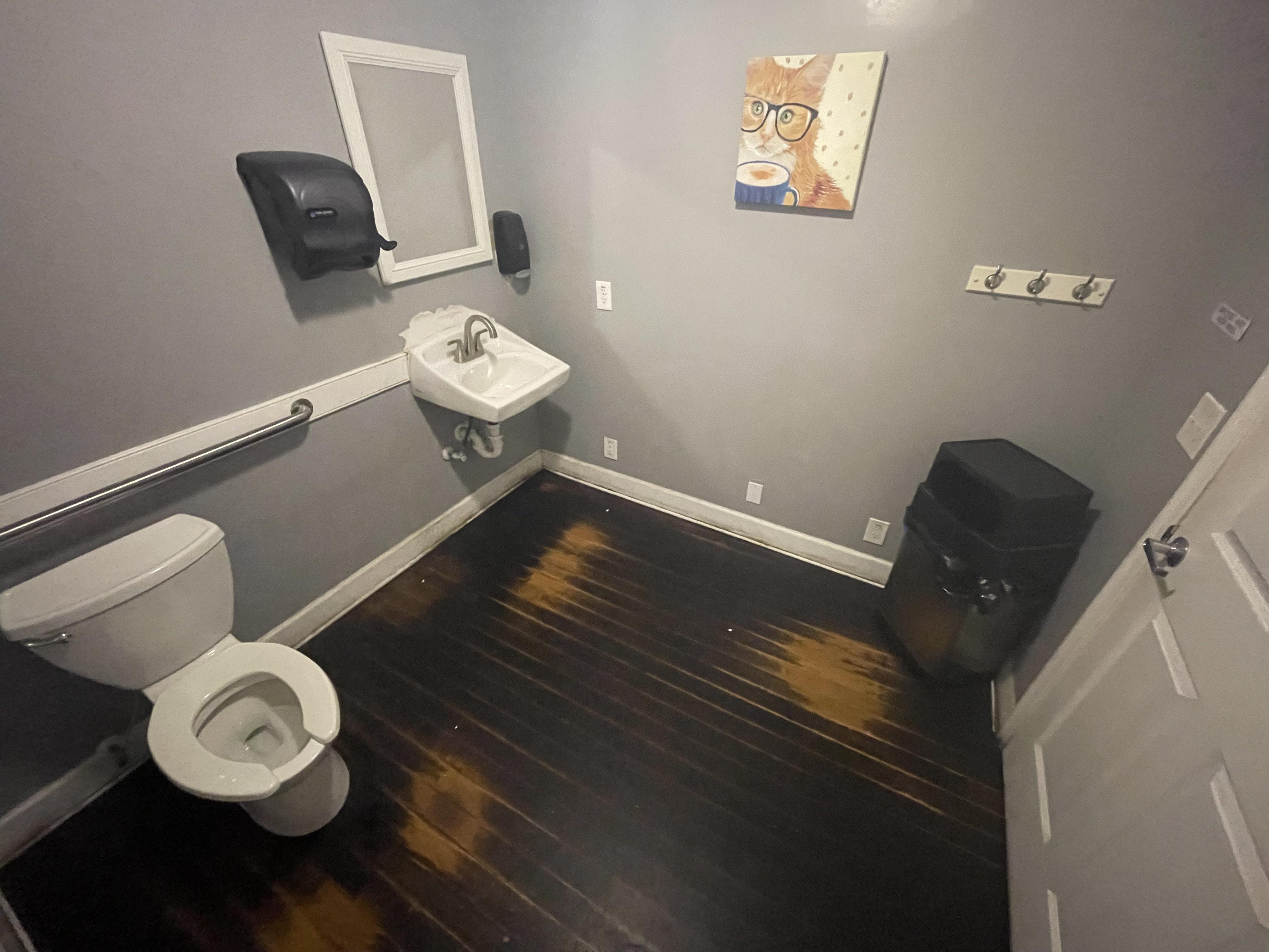 Bathroom floor of my local coffee shop Wellworn