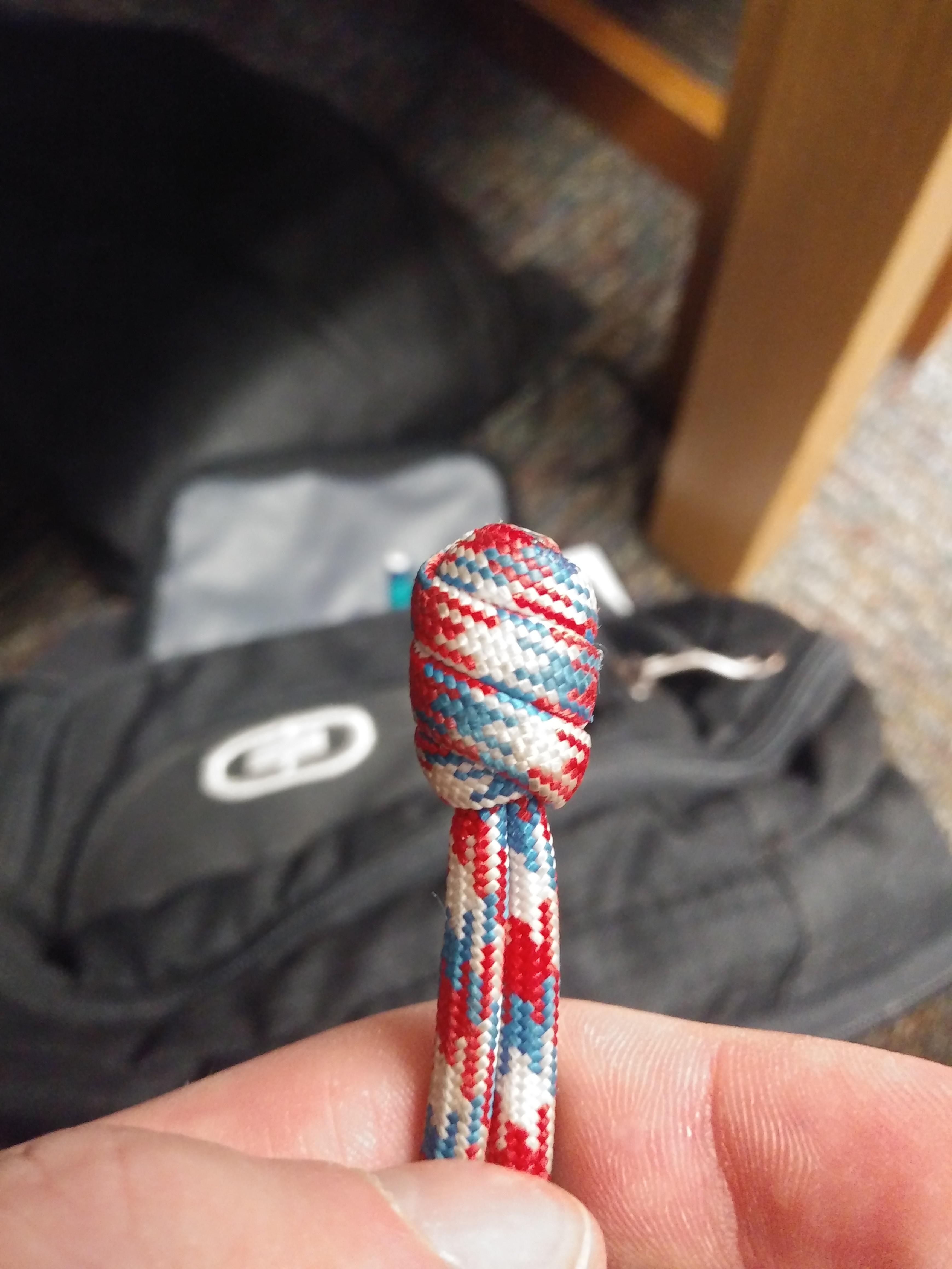 Can anyone identify the knot on the end of this zipper pull? Its like