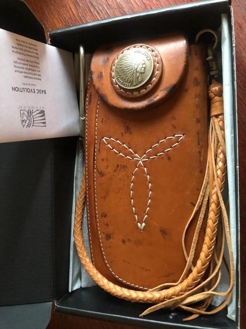 Hi Anyone to help me how to remove black spot on the leather redmoon