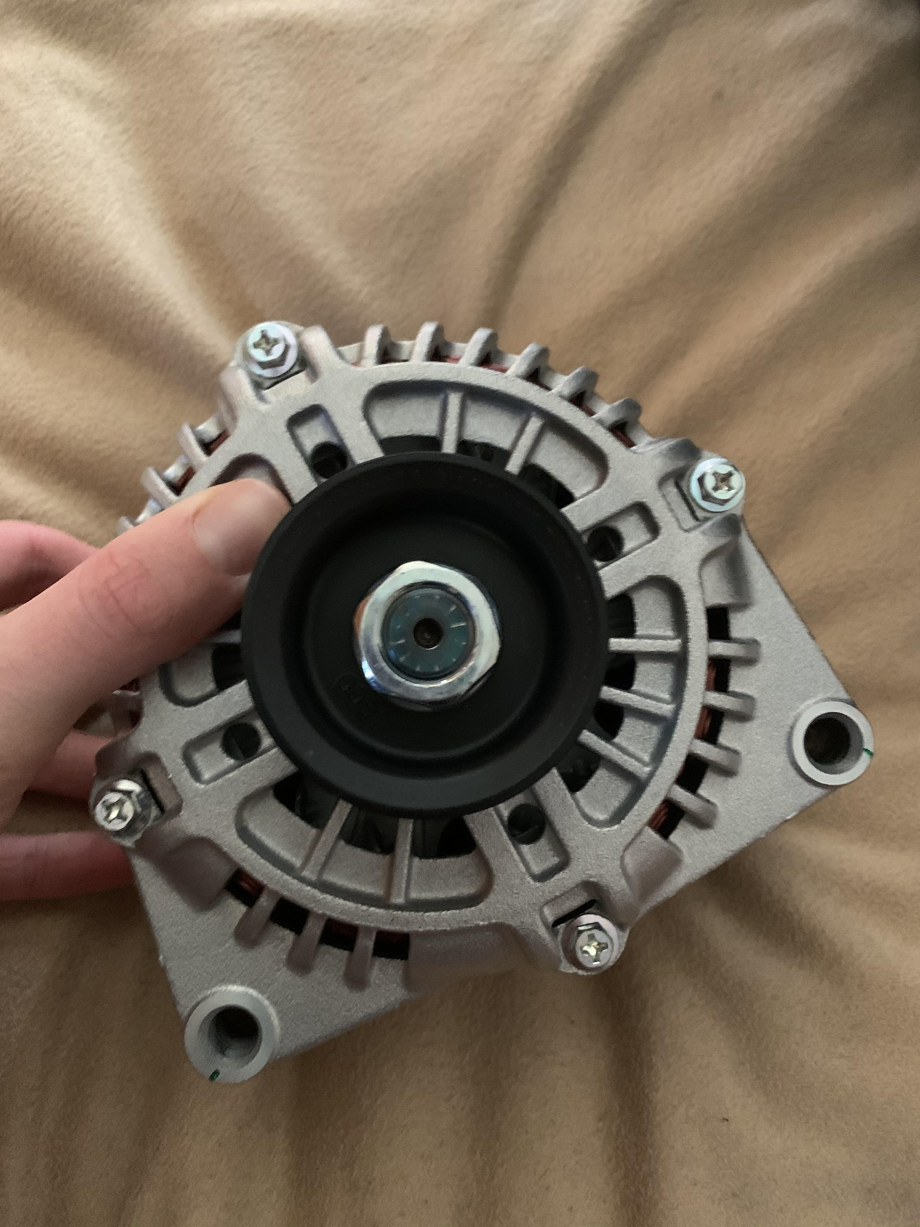 How can I remove and put on a alternator pully without power tools? Ls1