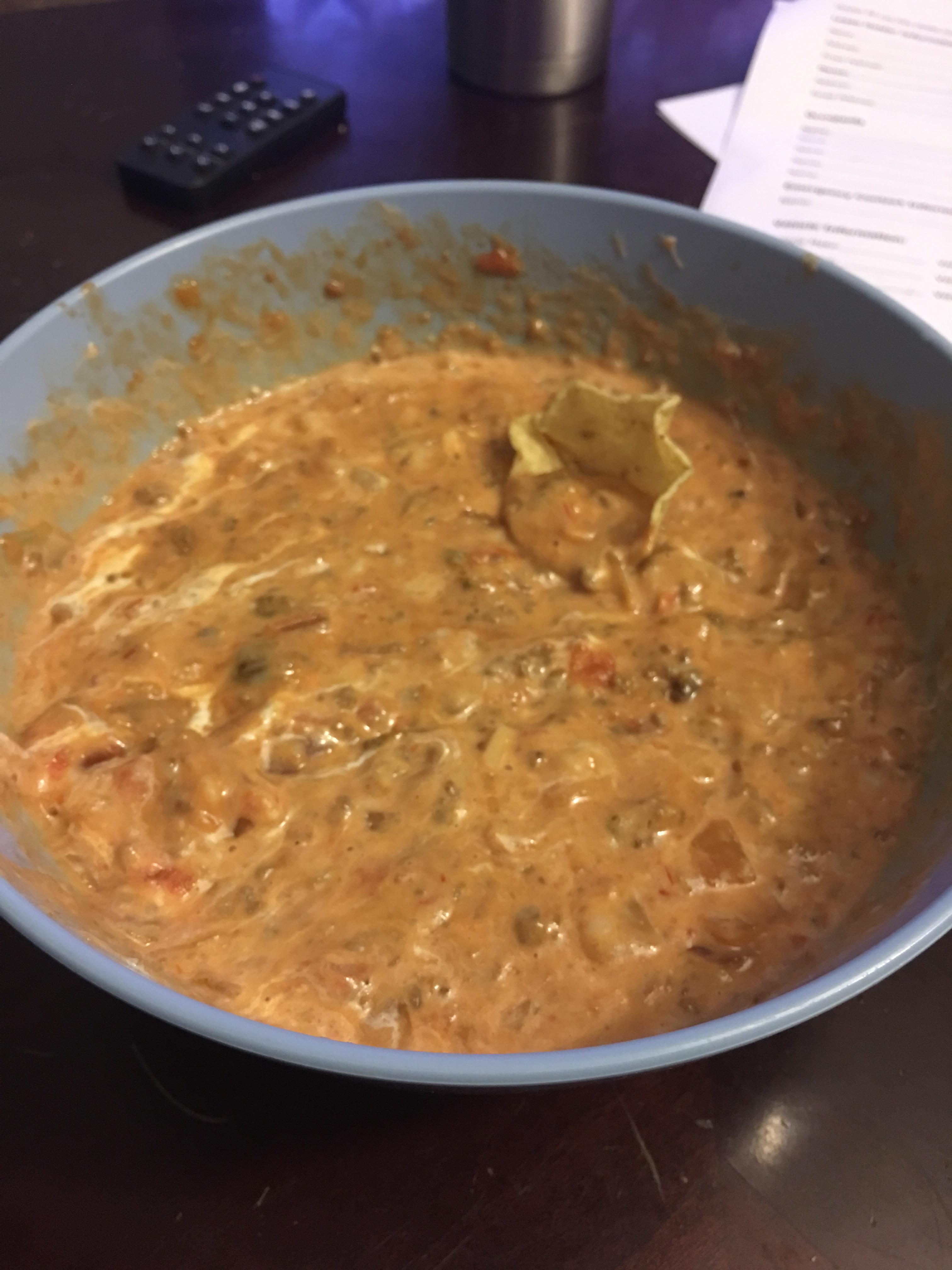 My homemade chip dip fake meat crumbles, melted daiya, salsa, and