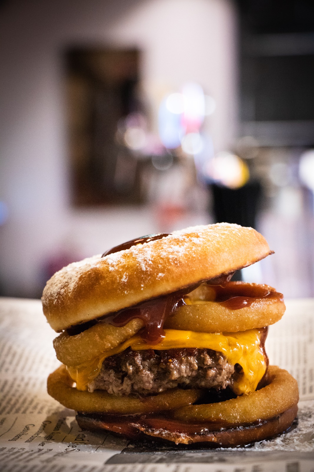 Onion rings, BBQ sauce, donutbun cheeseburger wolf_burger_joint r
