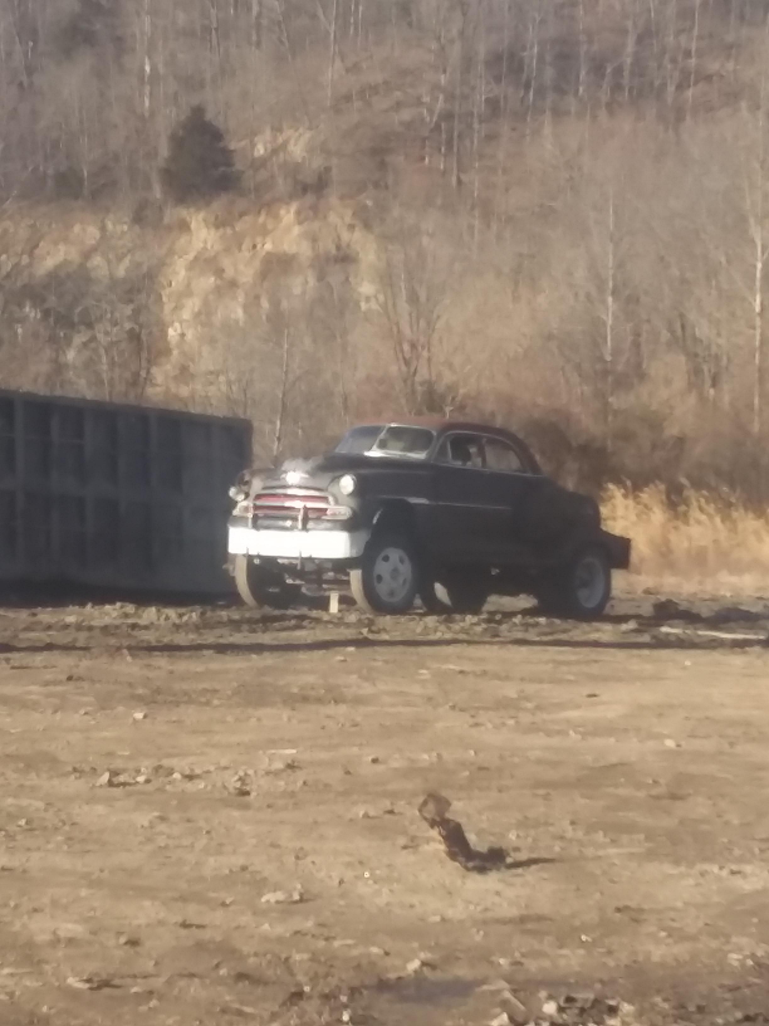 I saw this in a junkyard in Kentucky. 50's Chevrolet, raised suspension