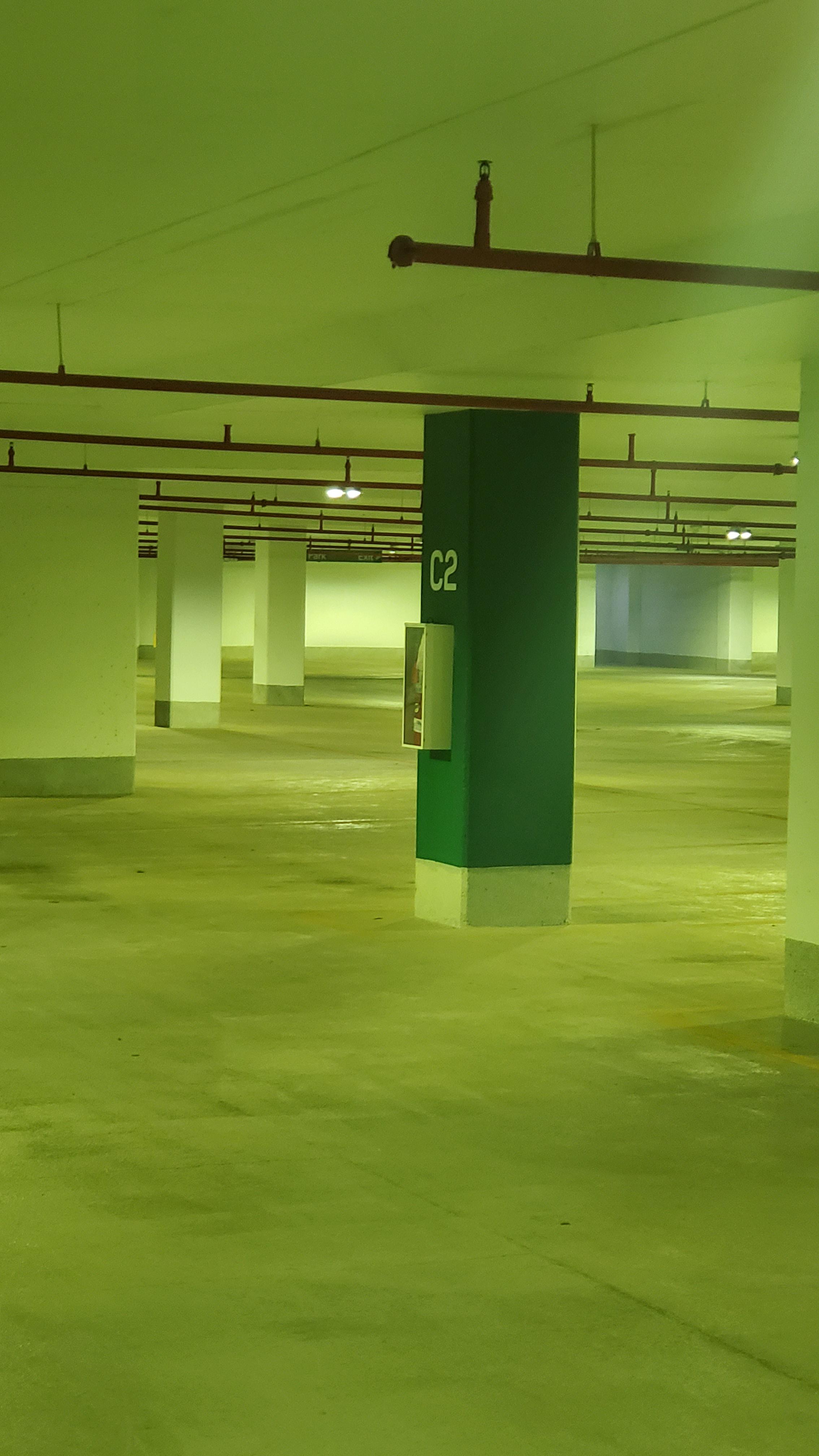 The greenish yellow light gives it a backrooms vibe. LiminalSpace