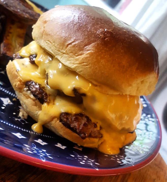 Homemade smashed style, extra cheesey, double beef patties with burger
