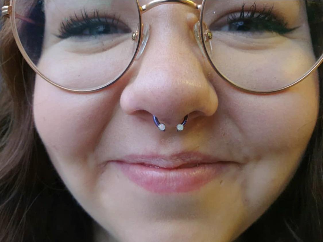 taken by my piercer just after my septum was done as you can see I