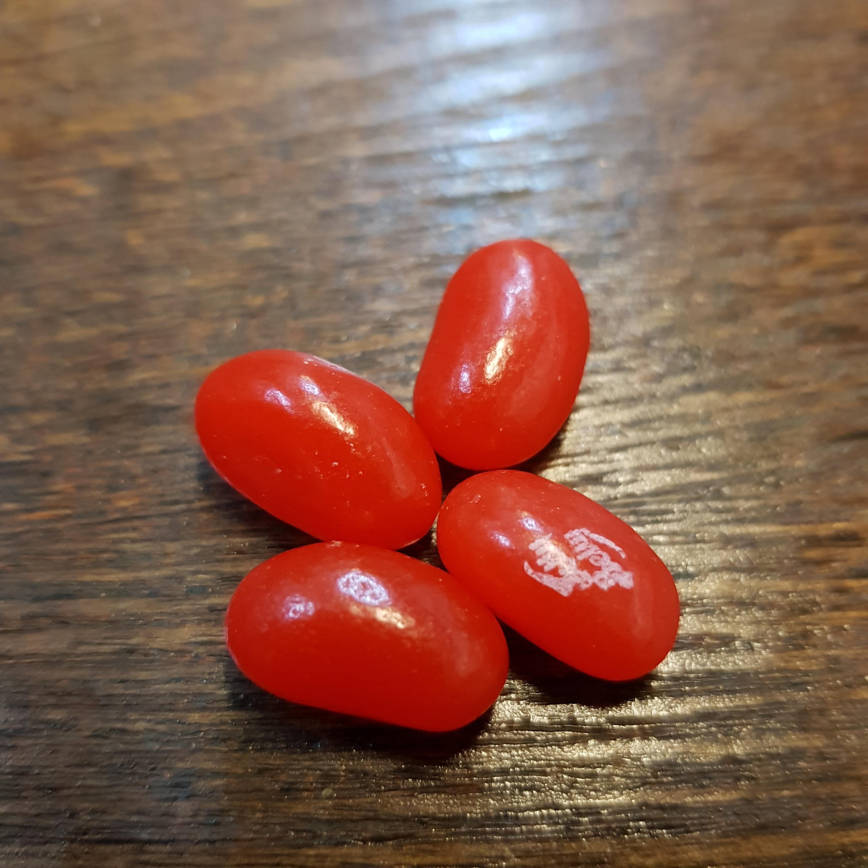 The cherry and cinnamon Jelly Belly's are both the same red. r