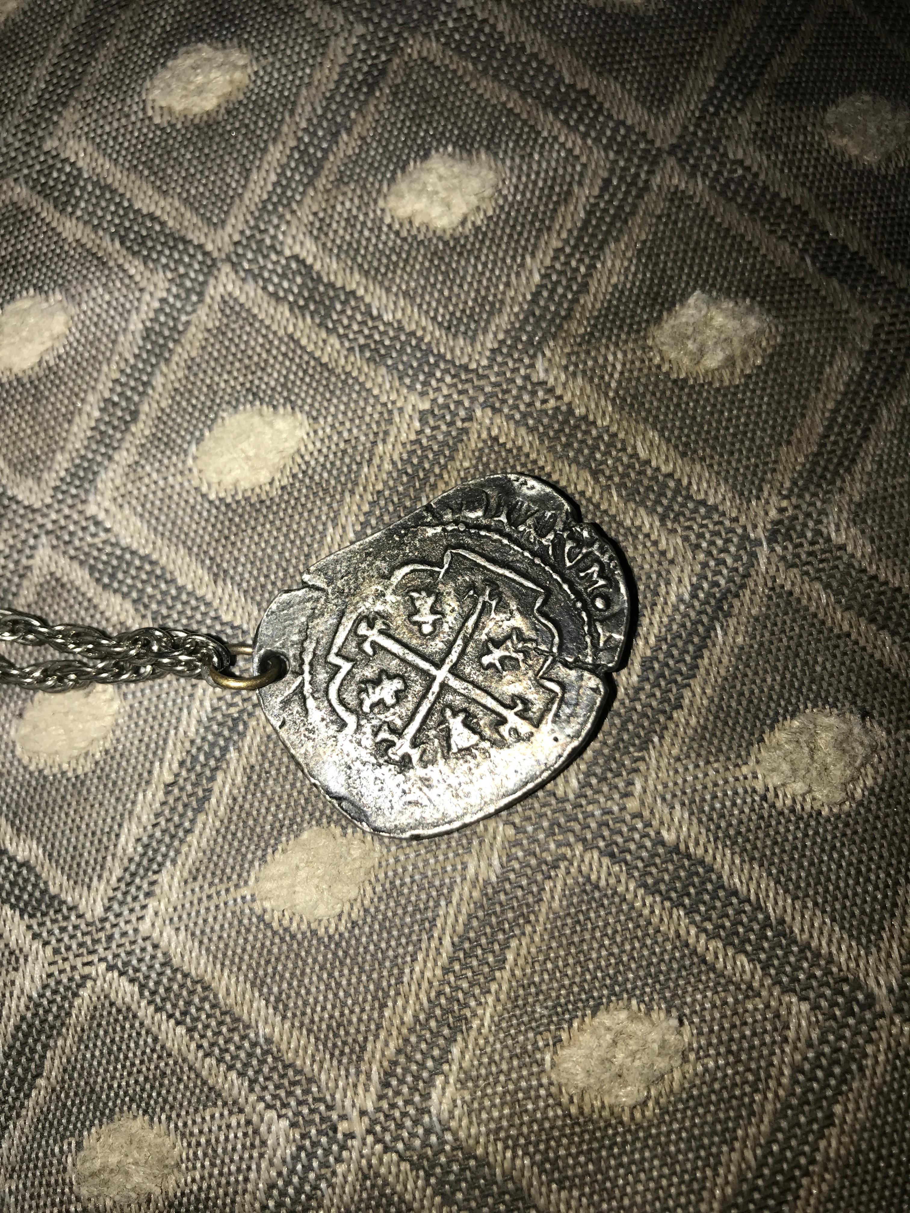 Historic necklace, maybe pendant date on it is 1713 and there is Latin