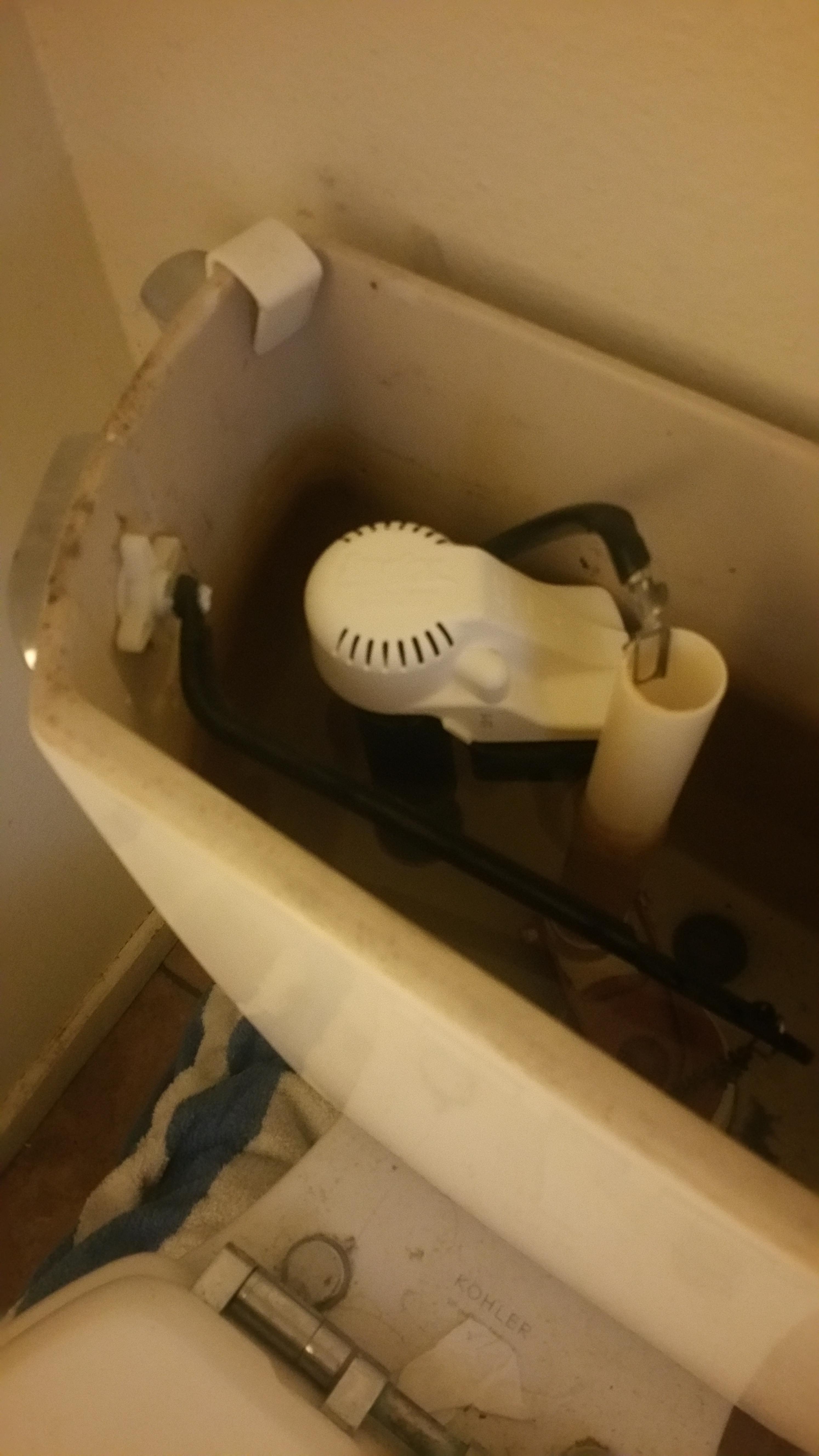 Toilet slowly overflowing out handle but water shuts of correctly in