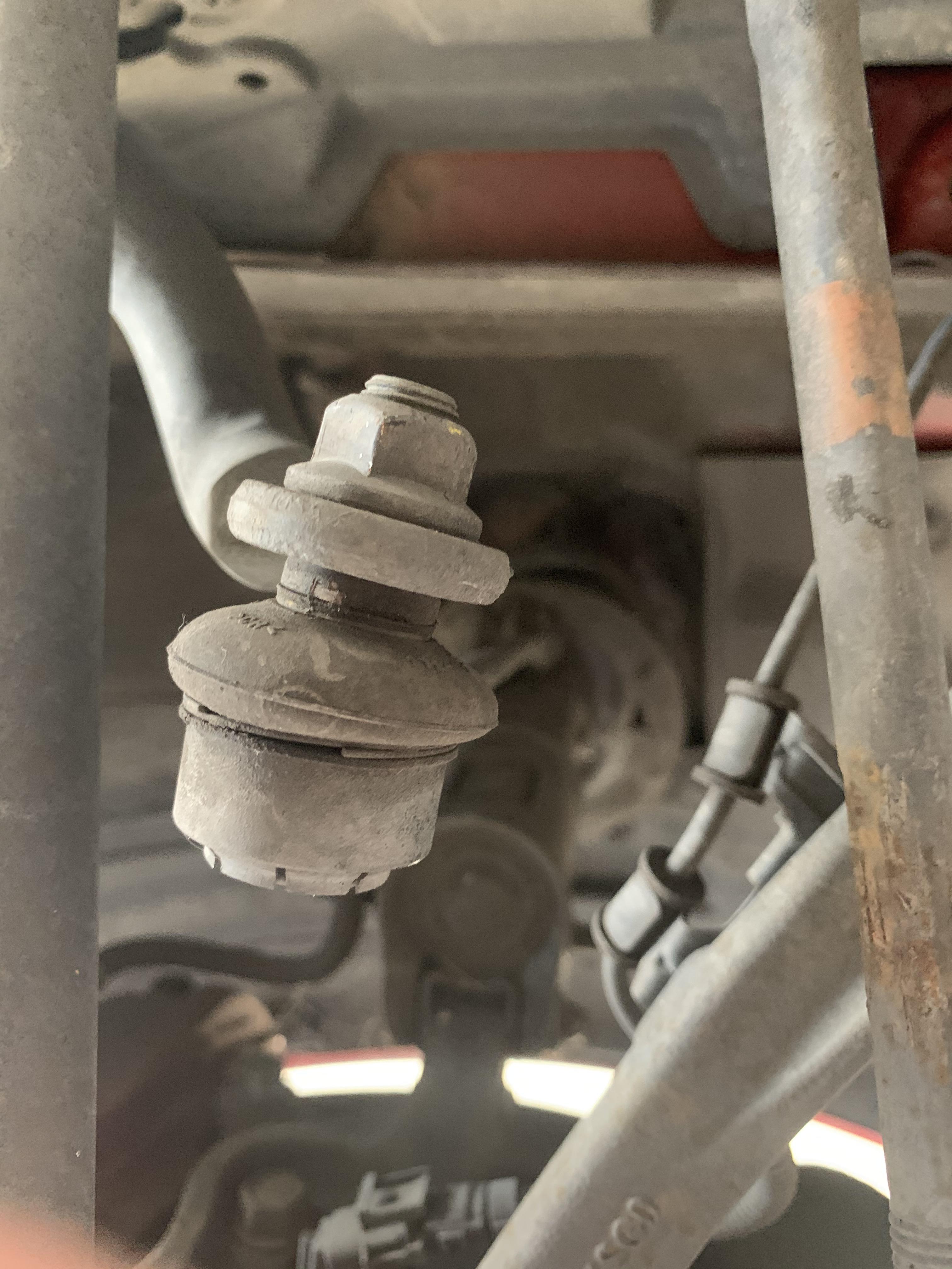 Coilover help? Trying to remove sway bar endlink bolt keeps spinning