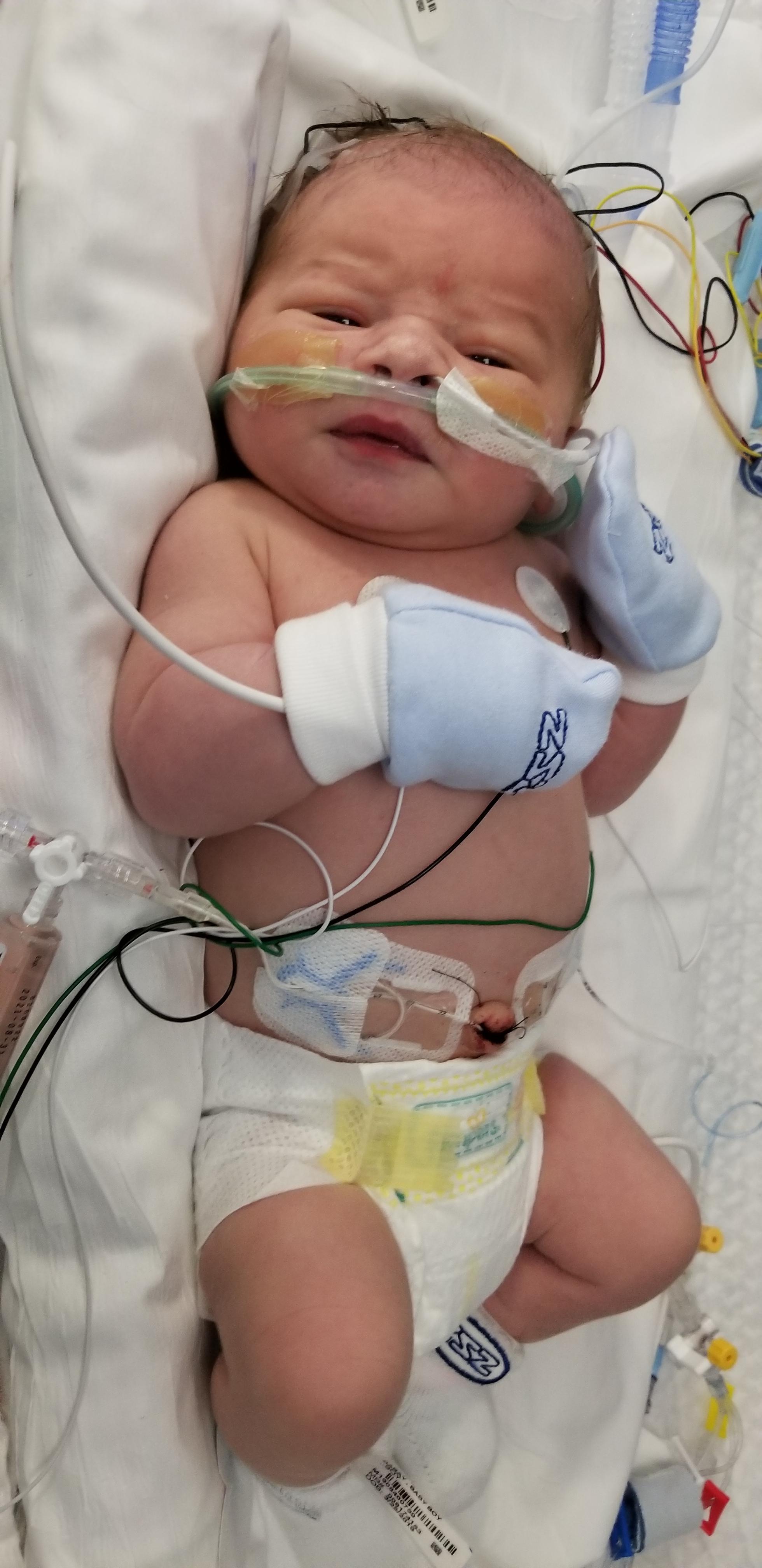 James Landon born March 25th, 9 lb 3 oz and 22 inches long!!! And 5 days late!! My baby 💓💓