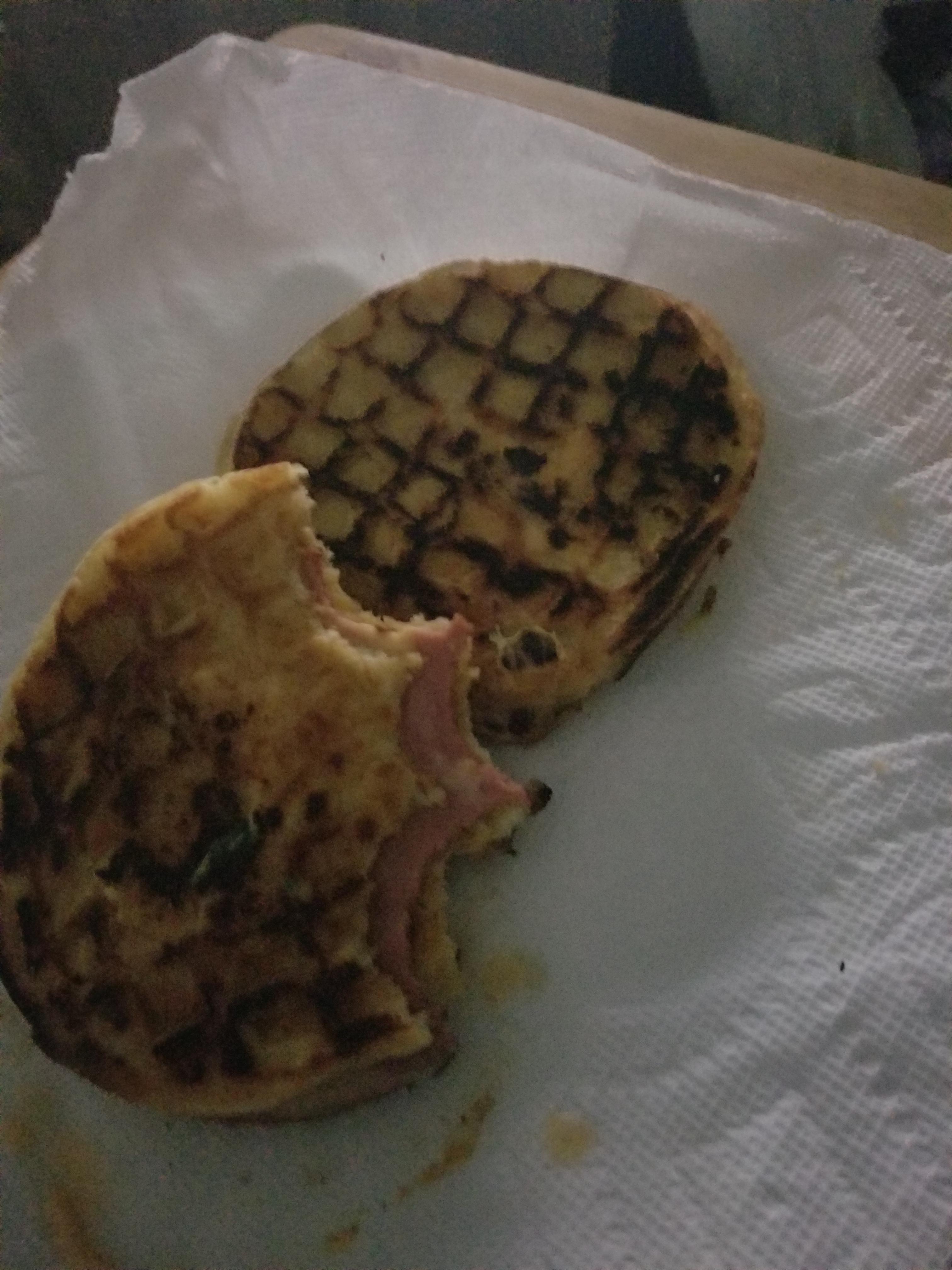 Grilled bologna and cheese w/shredded cheese, on waffle slices as bread