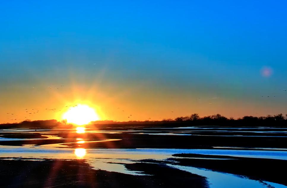 Sunset at Rowe Sandhill Crane Sanctuary near Gibbon, Nebraska on the Platt River on April 8