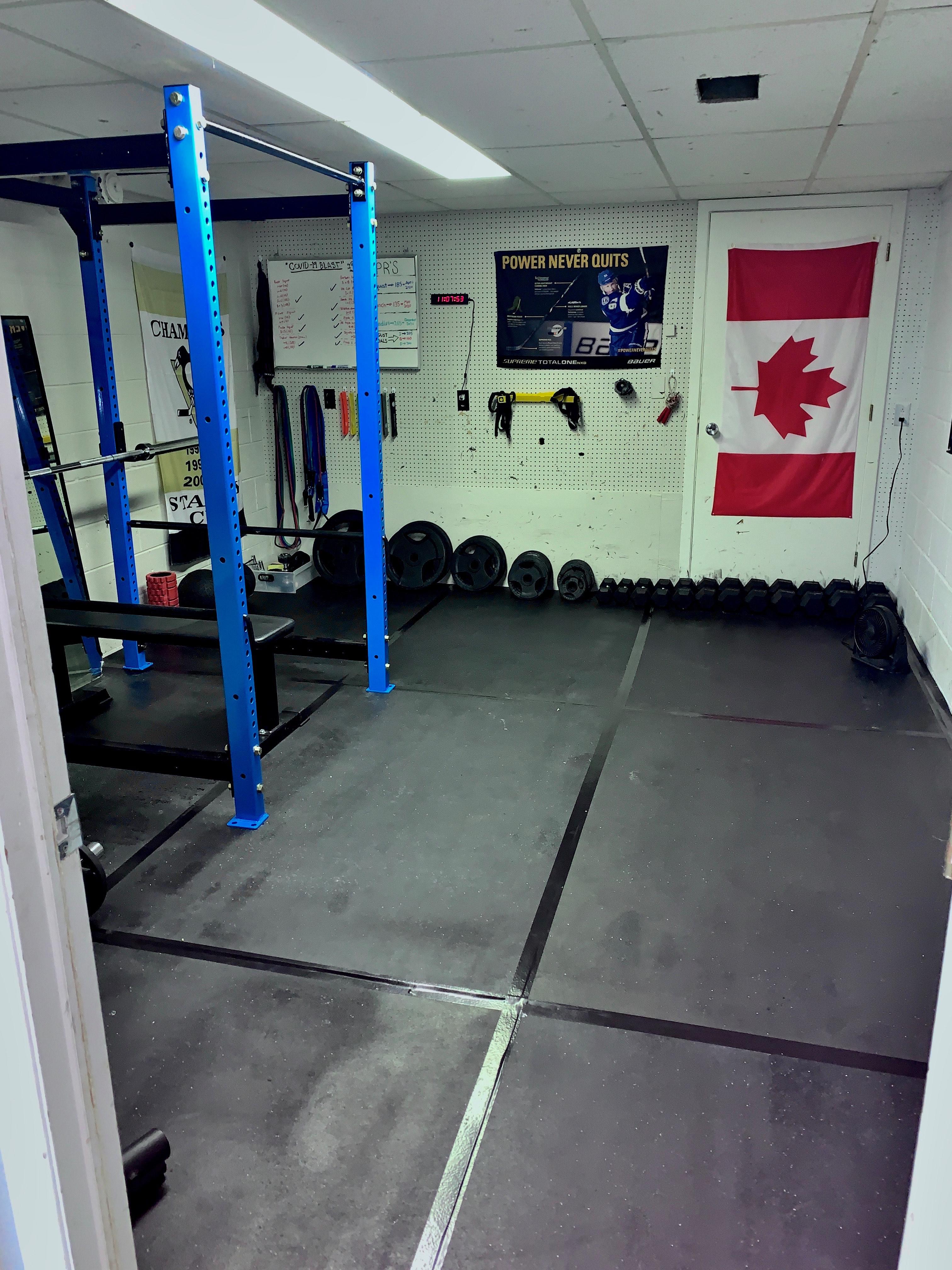 Laid some Horse Stall Mats down in my sons basement gym....looks good