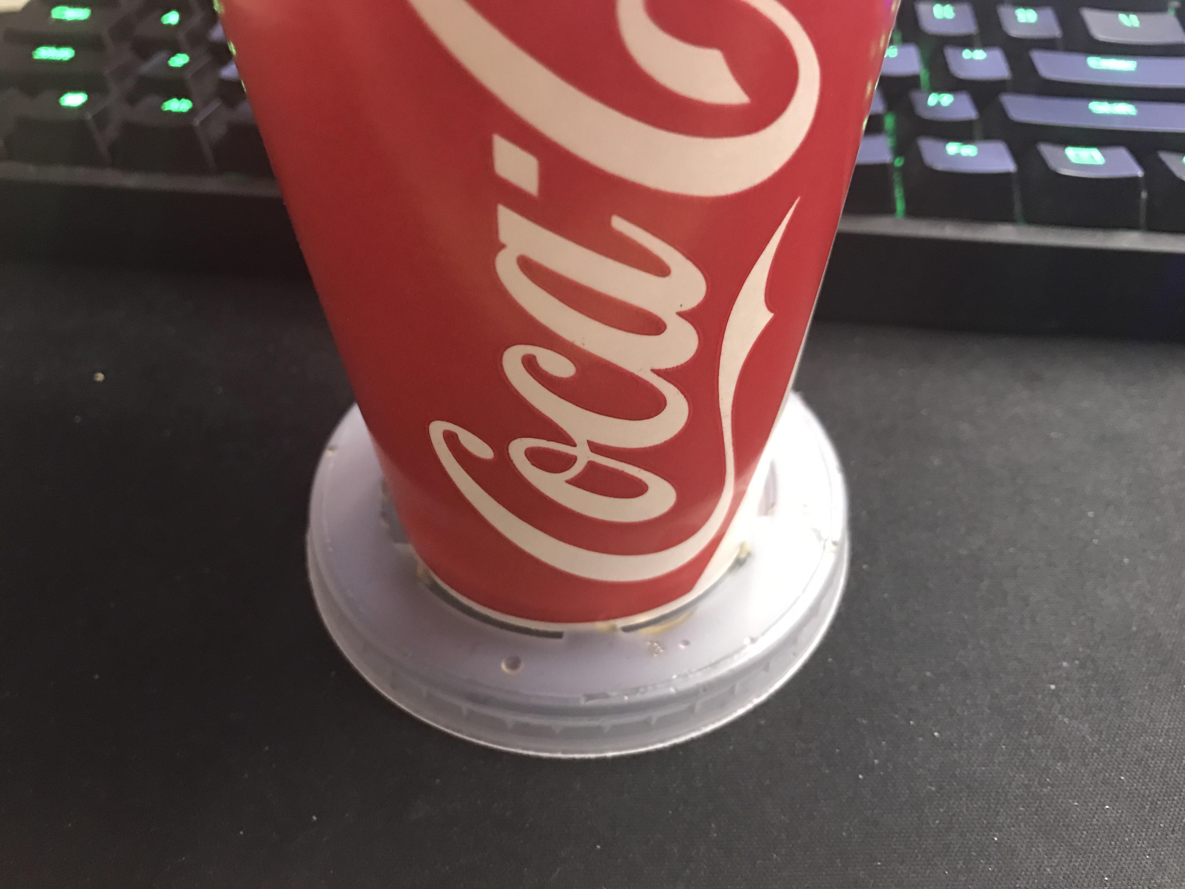 Soda cup lid doubles as a perfect coaster r/mildlyinteresting