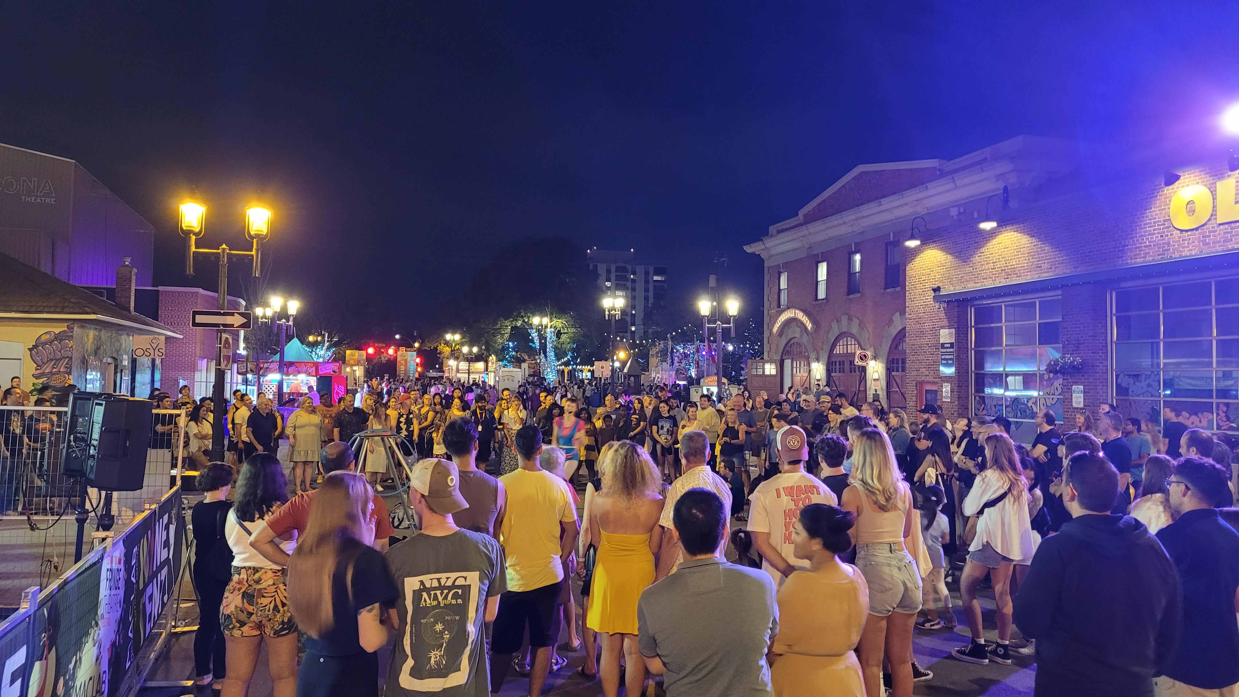 The Fringe in full swing on a hot summer night r/Edmonton