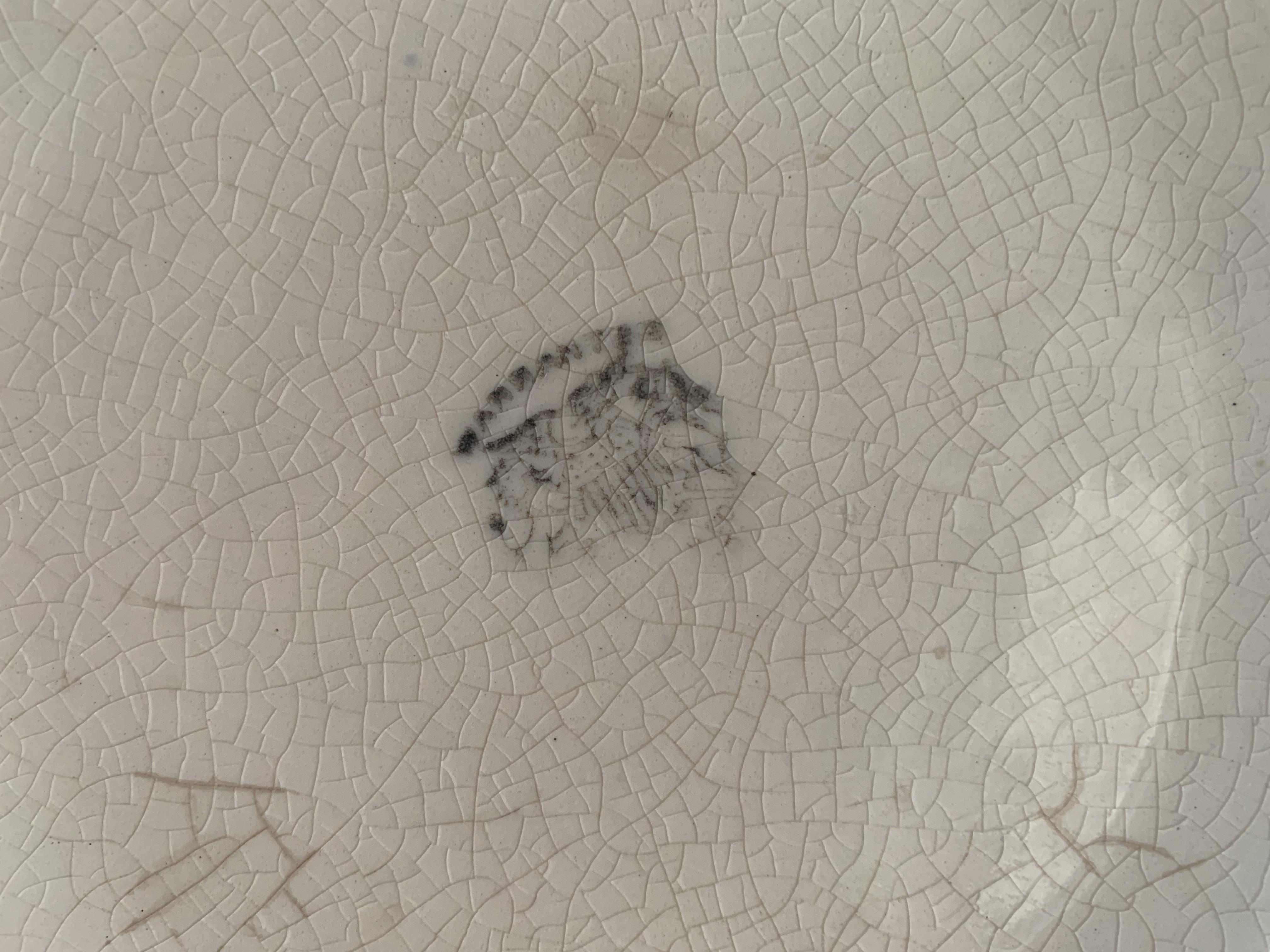 Anyone familiar with Ironstone stamps? I haven’t been able to make out this warranted stamp on a