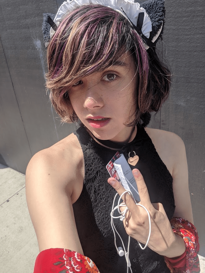 A bit stereotypical, but I had to wear cat ears here's a cute pic from