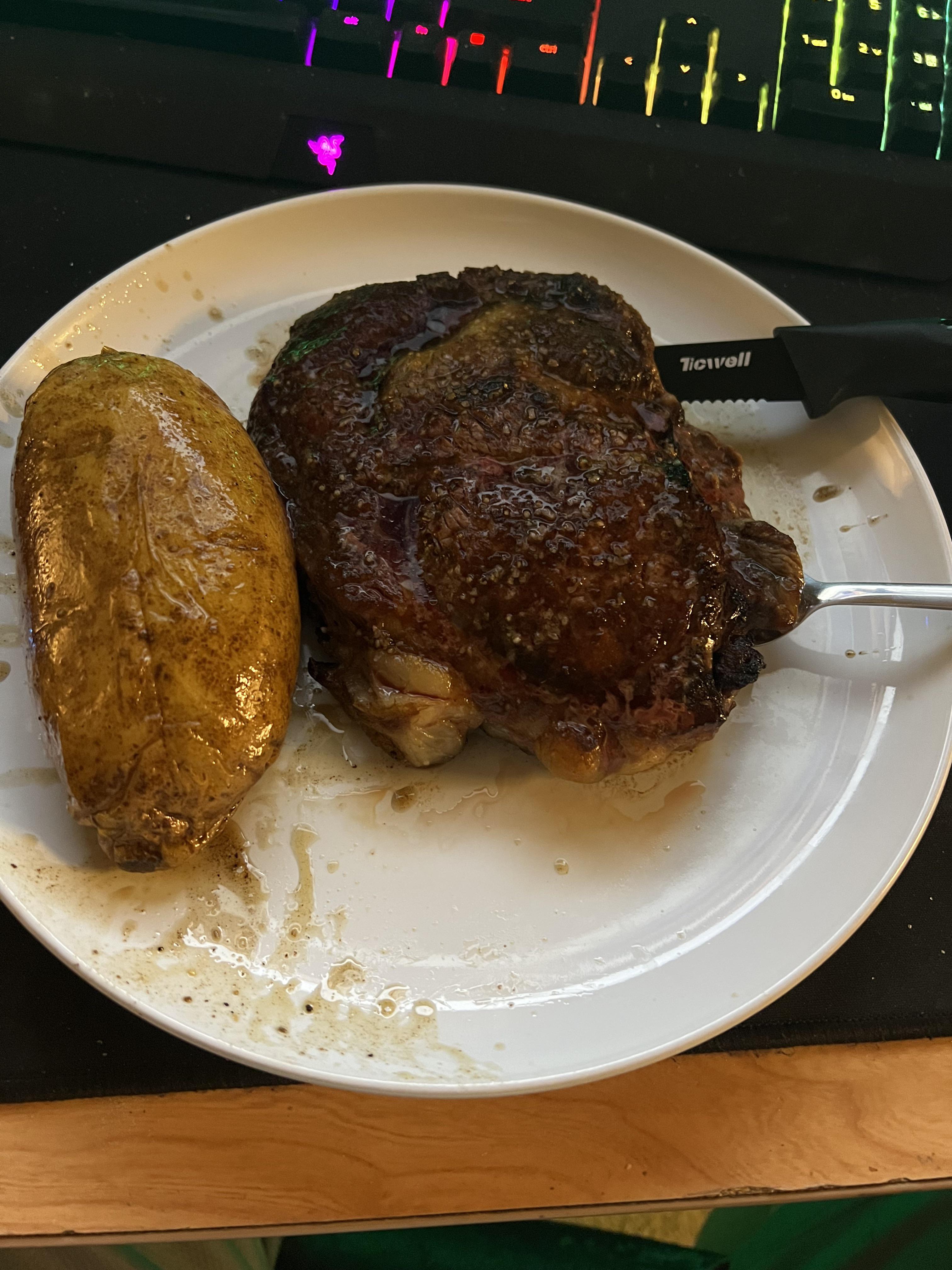 Pan seared ribeye finished in the oven, with a good ol’ baked potato