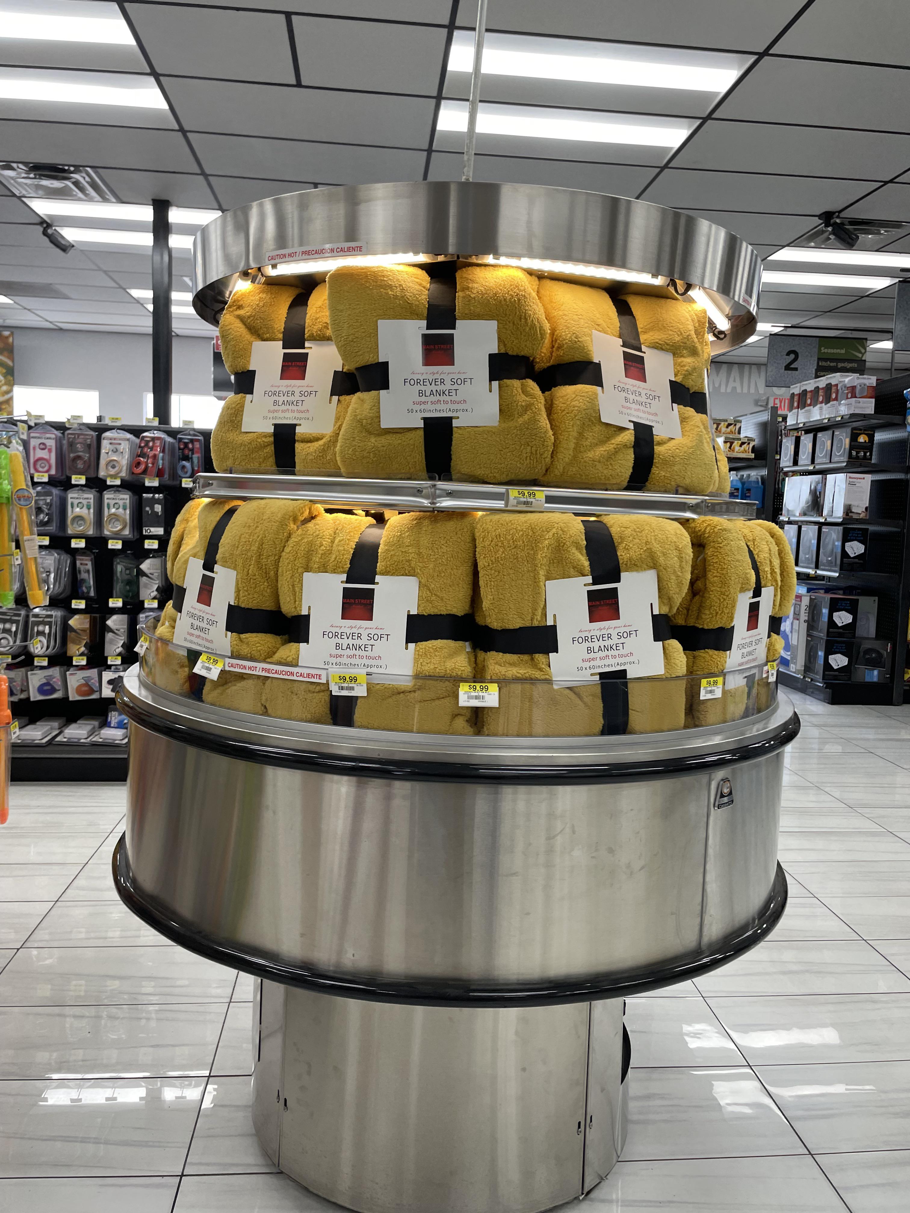 Blankets for sale in a food warmer to make the blankets warm at a gas station in New Mexico. r