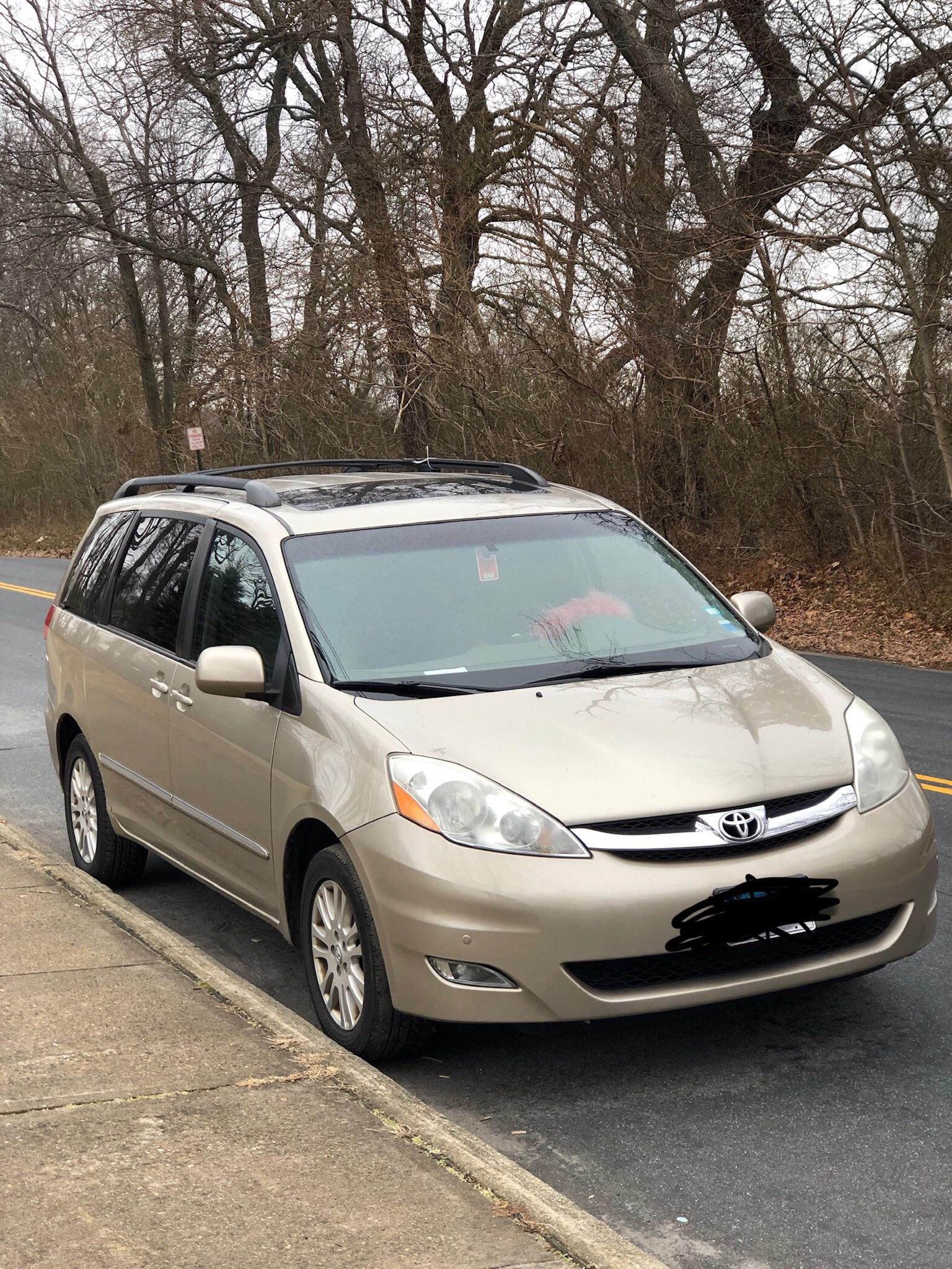 2010 Toyota Sienna, used to be my moms. Full of crumbs. RoastMyCar