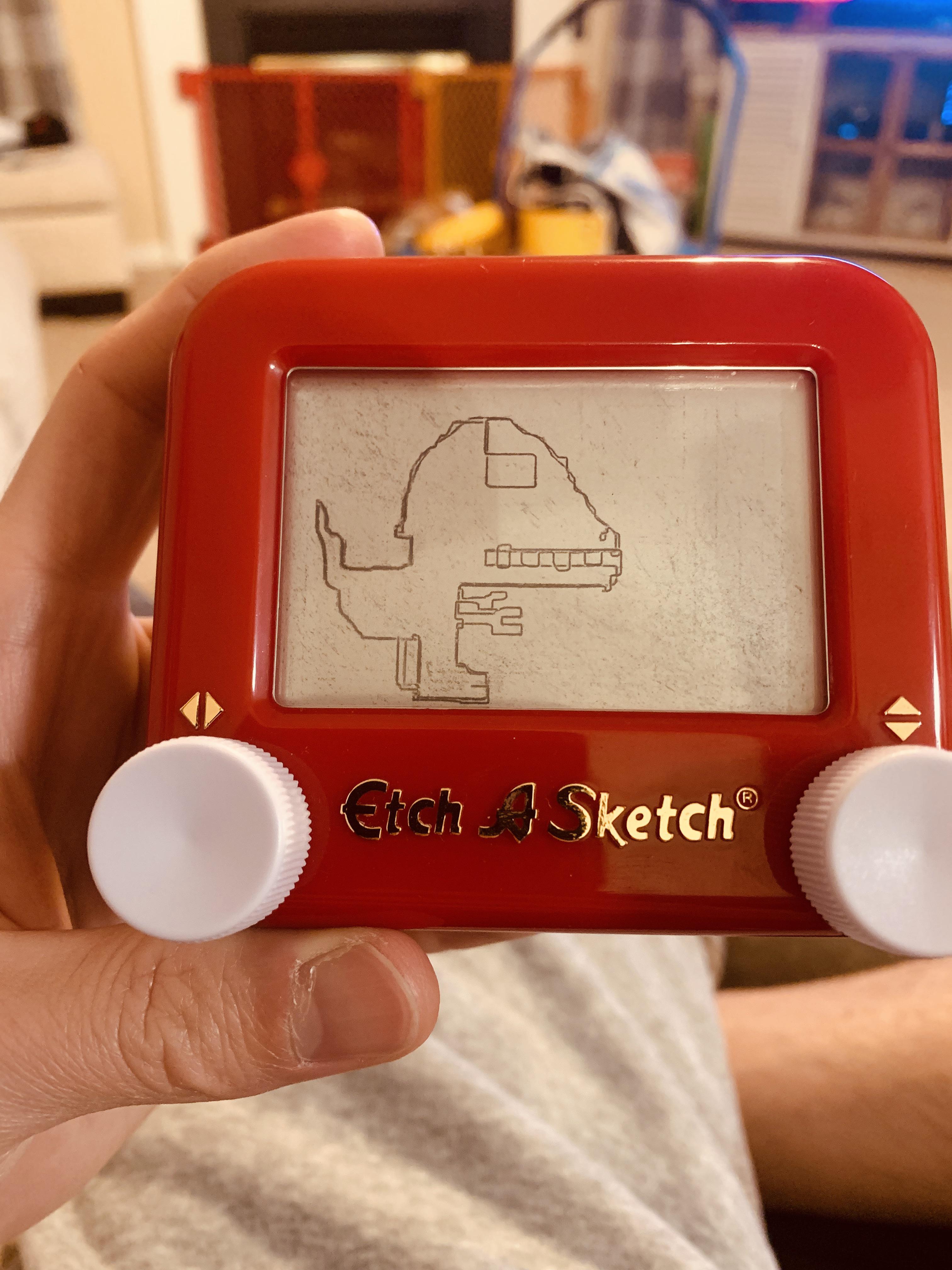 My 2 year old son asked me to draw a Velociraptor for him on his mini