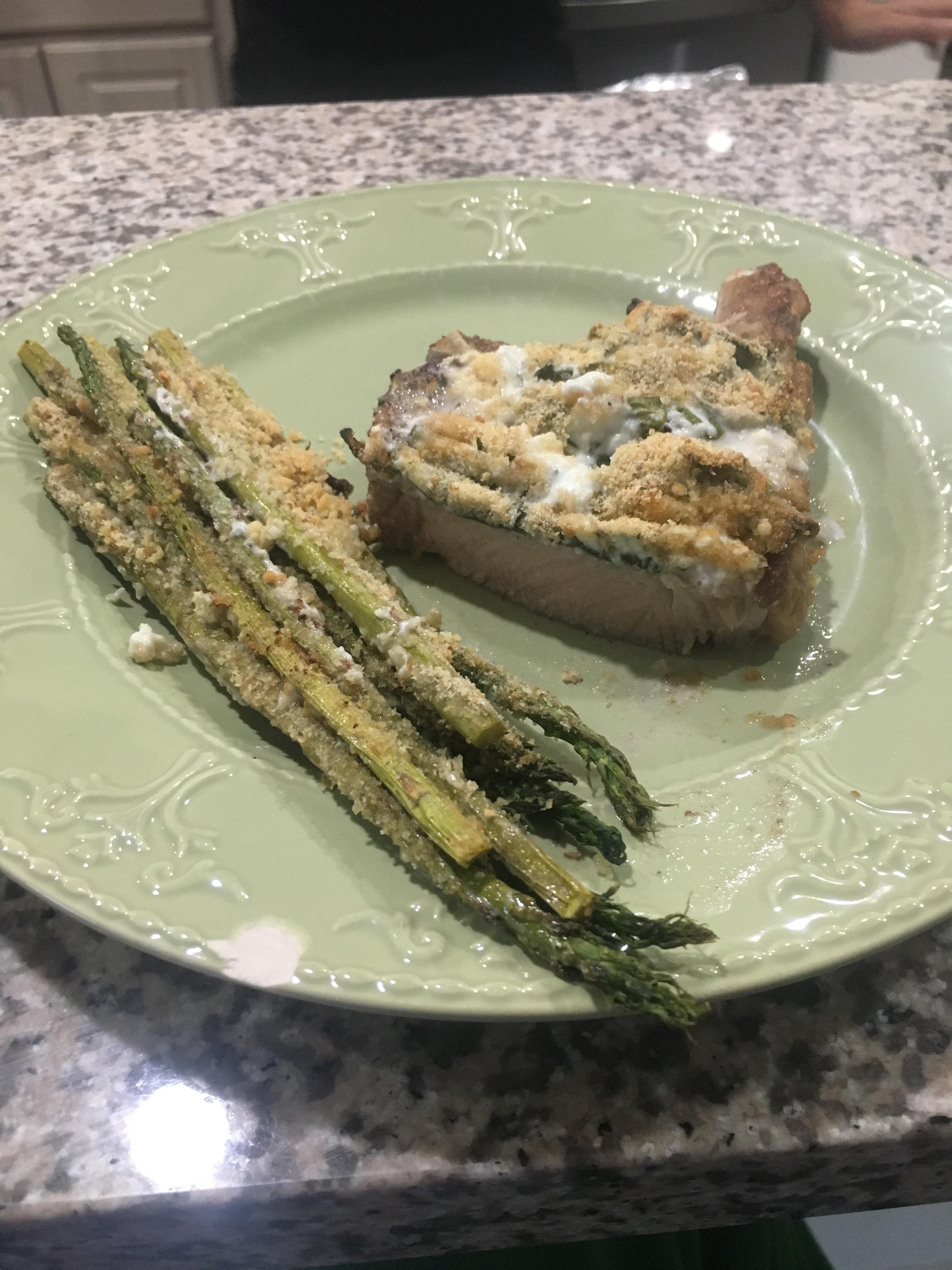 Step moms pork chop and asparagus with Parmesan cheese, bread crumbs