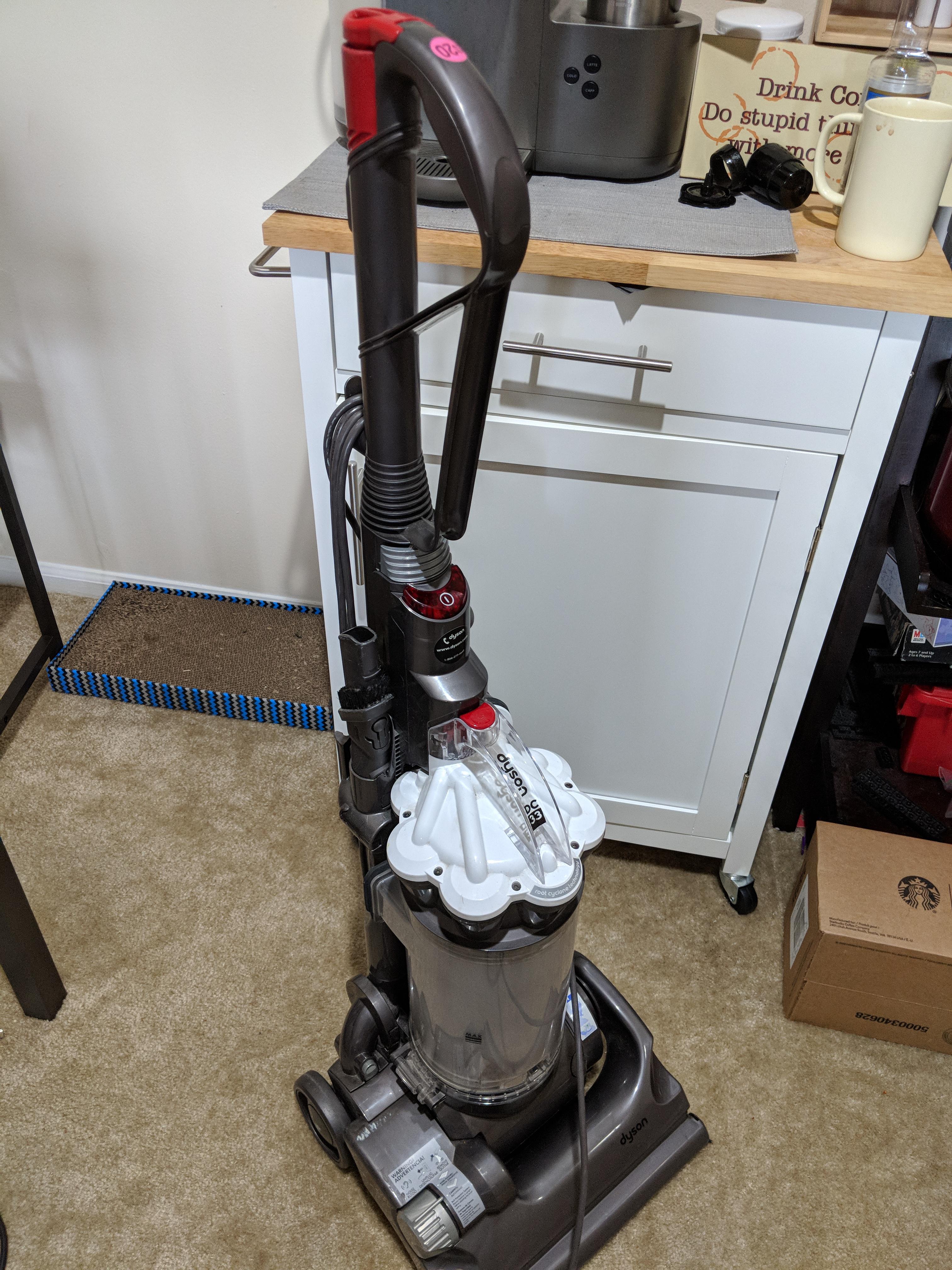 Dyson DC33 vaccum for 15 at a yard sale. After cleaning the brushroll