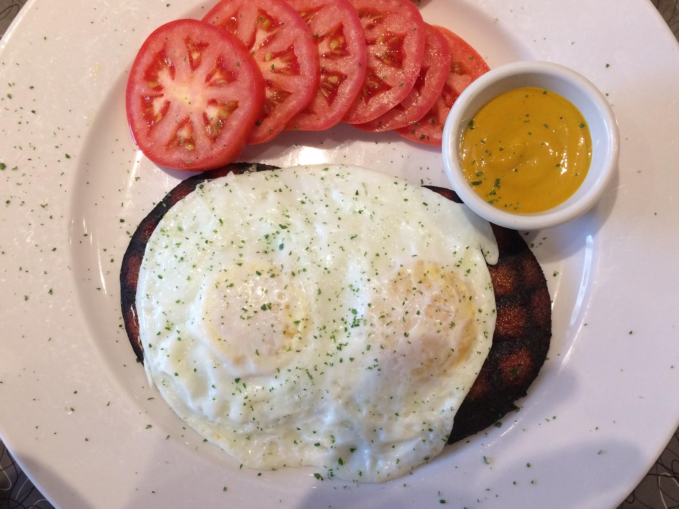 Fried bologna and eggs, with honey mustard and tomatoes. r